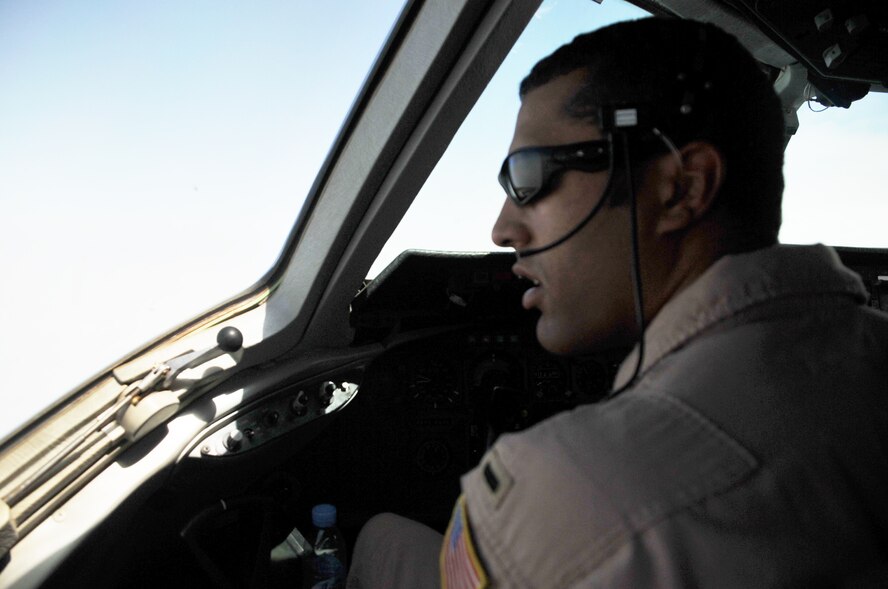 First Lt. Jason Brown, KC-10 Extender tanker pilot with the 908th Expeditionary Air Refueling Squadron, flies a KC-10 on an air refueling mission in the U.S. Central Command area of responsibility in Southwest Asia on April 24, 2010. Lieutenant Brown was deployed from the 2nd Air Refueling Squadron, 305th Air Mobility Wing, Joint Base McGuire-Dix-Lakehurst, N.J., and his hometown is Arvada, Colo. From Feb. 16-17, 2011, Air Mobility Command hosted a fuel efficiency summit at Scott Air Force Base, Ill., to share and collaborate on ideas and initiatives that will help better fuel efficiency across the Air Force. Aircrew Airmen like Lieutenant Brown have been key participants in creating and developing fuel efficiency initiatives since 2008 and will play a key role in future initiatives, officials said. (U.S. Air Force Photo/Master Sgt. Scott T. Sturkol) 