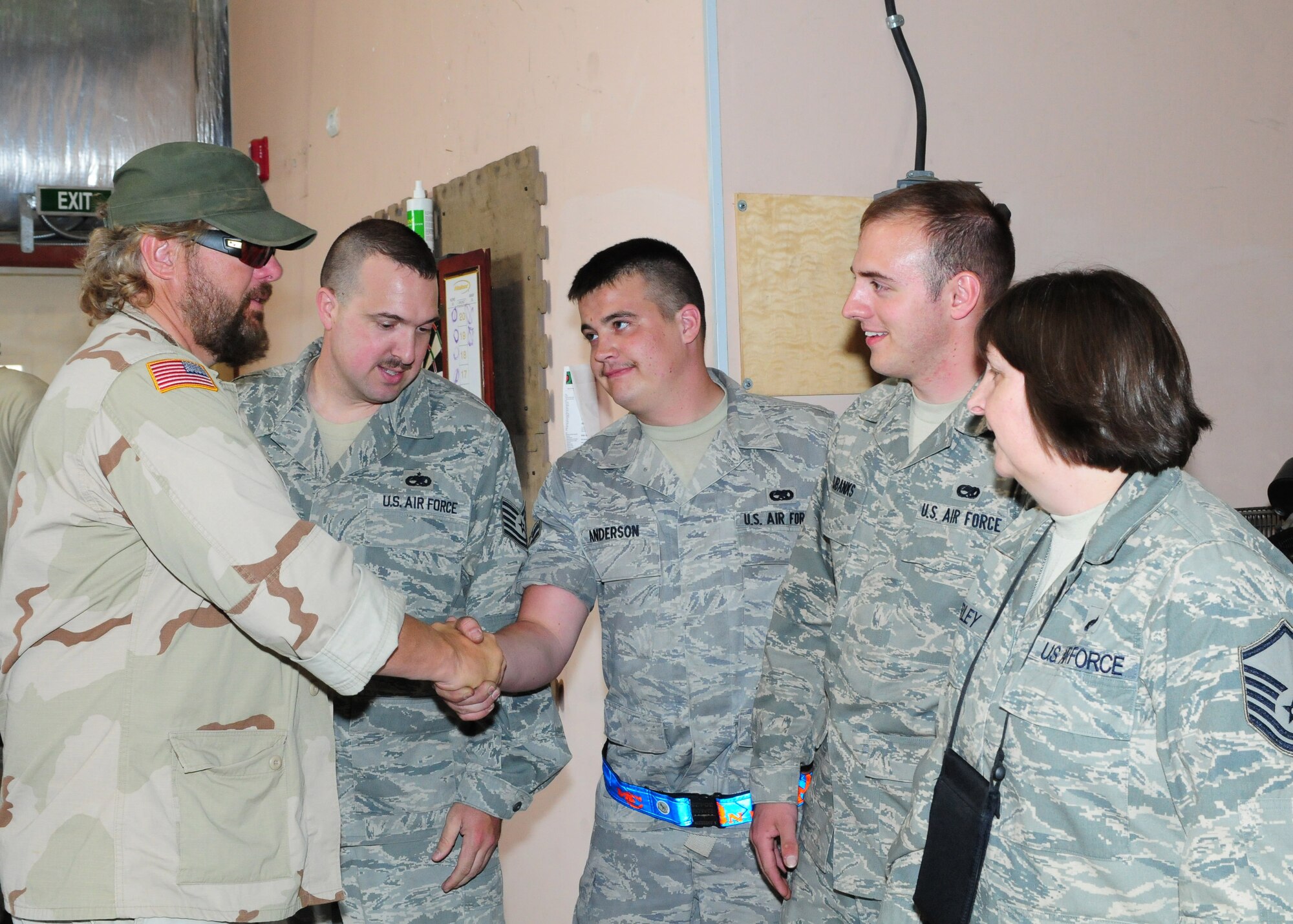 Toby Keith greets Airmen from the Transit Center at Manas, Kyrgyzstan, during a tour here May 7, 2010. (U.S. Air Force photo/Senior Airman Nichelle Anderson)