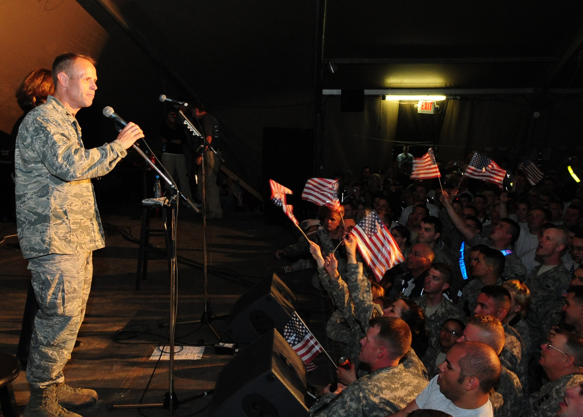 Col. Blaine Holt, 376th Air Expeditionary Wing commander, introduces Toby Keith during a USO concert at Pete's Place May 7, 2010. (U.S. Air Force photo/ Senior Airman Nichelle Anderson)