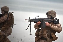 Marines with 3rd Battalion, 24th Marine Regiment rush Carson Beach in South Boston as part of an amphibious assault demonstration May 8, 2010. Throngs of Bostonians watched as Marine dismounted amphibious assault vehicles and used tanks to clear the beach of a notional enemy.