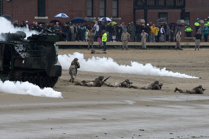 Marines of 3rd Battalion, 24th Marines, storm Carson beach at Joe Moakley Park, Boston as part an amphibious assault vehicle demonstration during Marine Week Boston, May 8, 2010. Marine Week provides an opportunity to increase public awareness of the Marine Corps' value to our nation's defense and to preserve and mature the Corps' relationship with the American people.