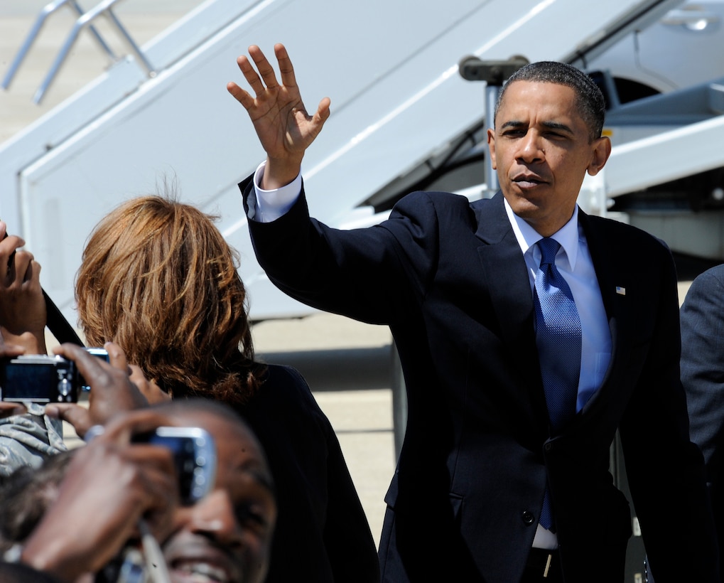 LANGLEY AIR FORCE BASE, Va. -- President Barack Obama bids farewell to the crowd of enthused Team Langley members during his first visit to Langley May 9. President Obama delivered the commencement address at nearby Hampton University, emphasizing the importance of education and good citizenship to graduates. (U.S. Air Force photo/Senior Airman Dana Hill)
