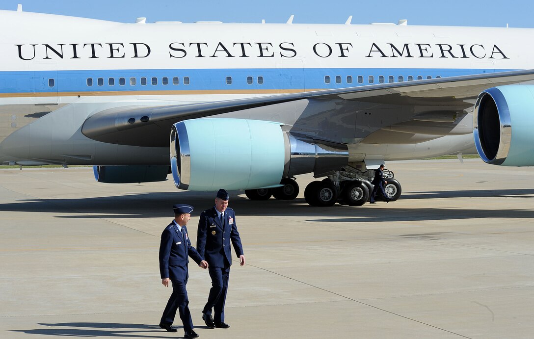 LANGLEY AIR FORCE BASE, Va. -- Lt. Gen. William J. Rew, Air Combat Command vice commander, and Col. Donald E. Kirkland, 633d Air Base Wing commander, discuss the president’s visit May 9. President Obama delivered the commencement address at nearby Hampton University, emphasizing the importance of education and good citizenship to graduates. (U.S. Air Force photo/Staff Sgt. Christina M. Styer)