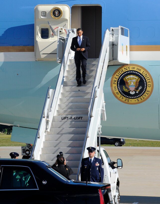 LANGLEY AIR FORCE BASE, Va. -- President Barack Obama disembarks Air Force One May 9. President Obama delivered the commencement address at nearby Hampton University, emphasizing the importance of education and good citizenship to graduates. (U.S. Air Force photo/Senior Airman Dana Hill)