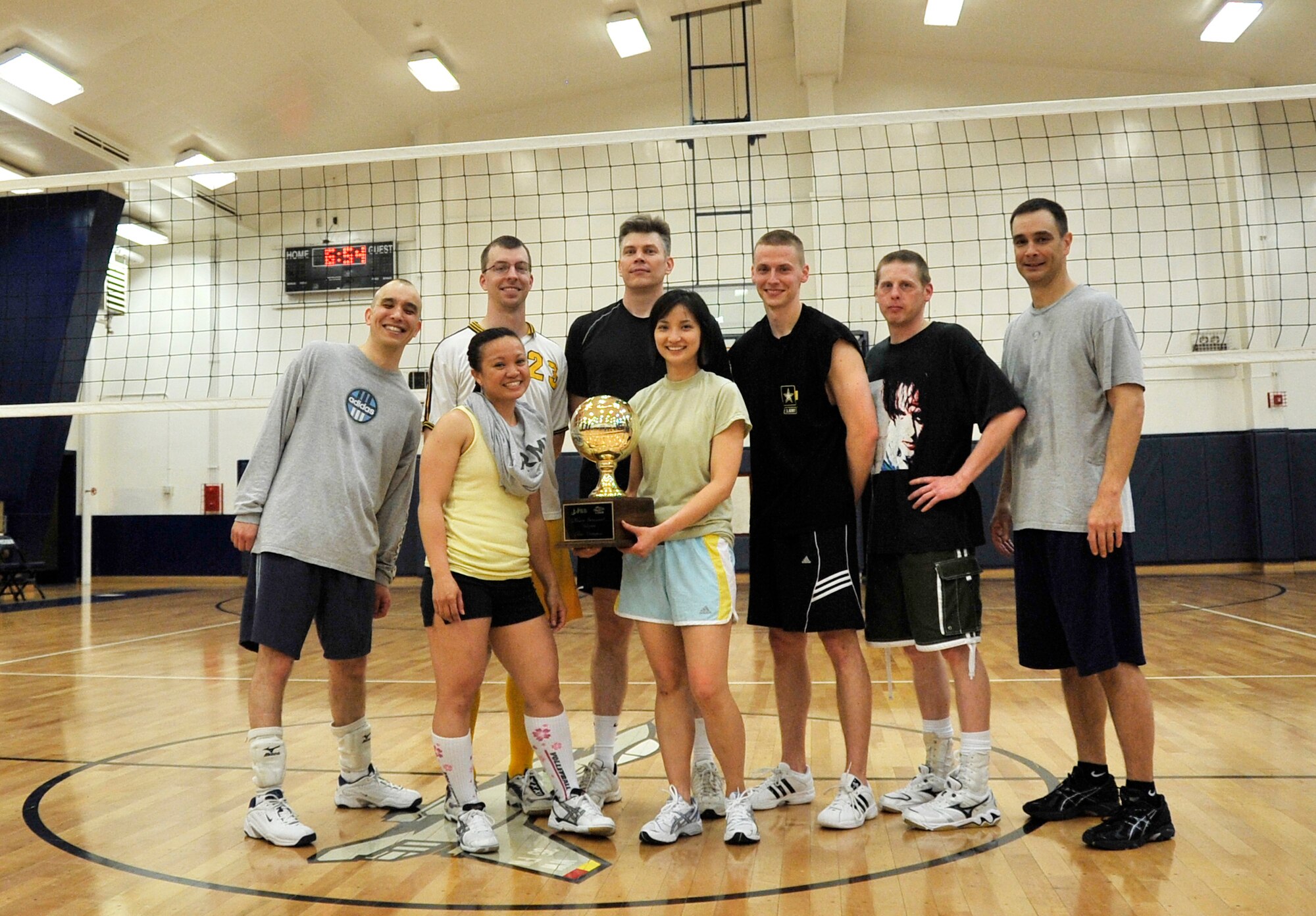 MISAWA AIR BASE, Japan -- Team Misawa Security Operations Center receives the volleyball base championship trophy May 6. Team MSOC beat the 35th Civil Engineer ?Fire Dogs? two games to zero. (U.S. Air Force photo/Staff Sgt. Chad C. Strohmeyer)