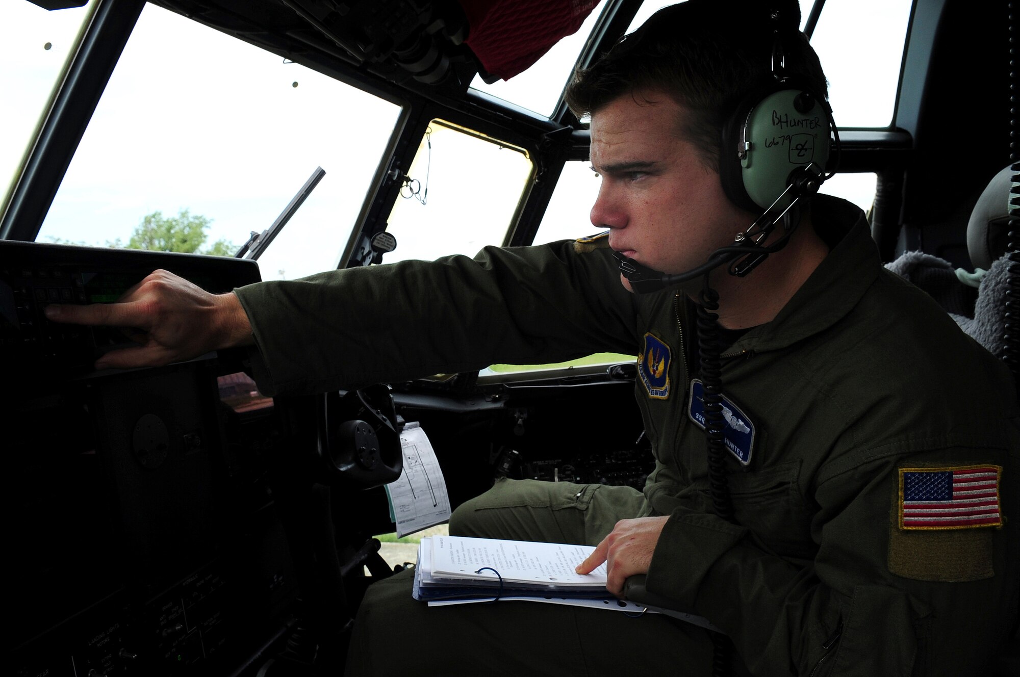 U.S. Air Force Staff Sgt. Brett Hunter, 37th Airlift Squadron loadmaster, conducts pre-flight checks on a C-130J in preparation for the joint exercise Carpathian Summer 2010, Otopeni Airlift Wing , May 10, 2010. Members of the U.S. and Romanian Air Forces joined together for a week long exercise to build partnerships and enhance proficiency in working together. (U.S. Air Force Photo by Staff Sgt. Jocelyn Rich)