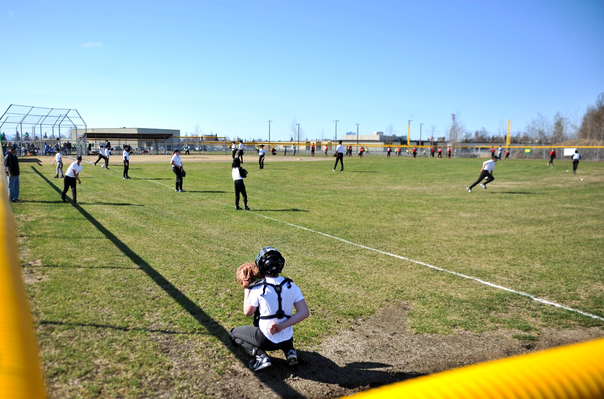 ELMENDORF AIR FORCE BASE, Alaska – A Fort Richardson Little League baseball team warms up before a game against an Elmendorf Little League team following the Elmendorf and Fort Richardson 2010 Little League Baseball and Softball opening ceremonies May 8. 
