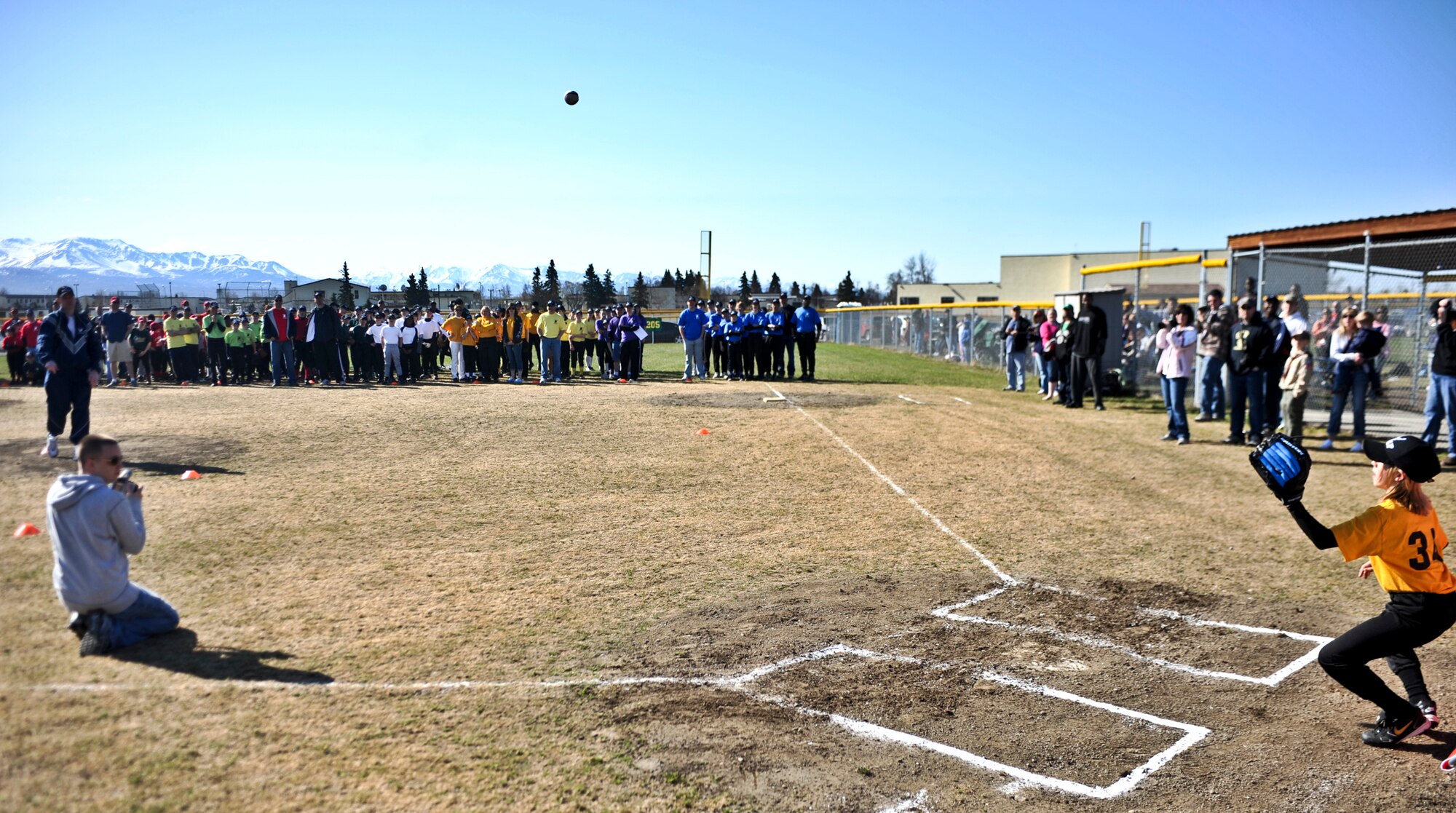 ELMENDORF AIR FORCE BASE, Alaska – Col. Jeffery Vinger, Provisional Joint Base Elmendorf-Richardson commander, throws out the first pitch during the Elmendorf and Fort Richardson 2010 Little League Baseball and Softball opening ceremonies May 8. 