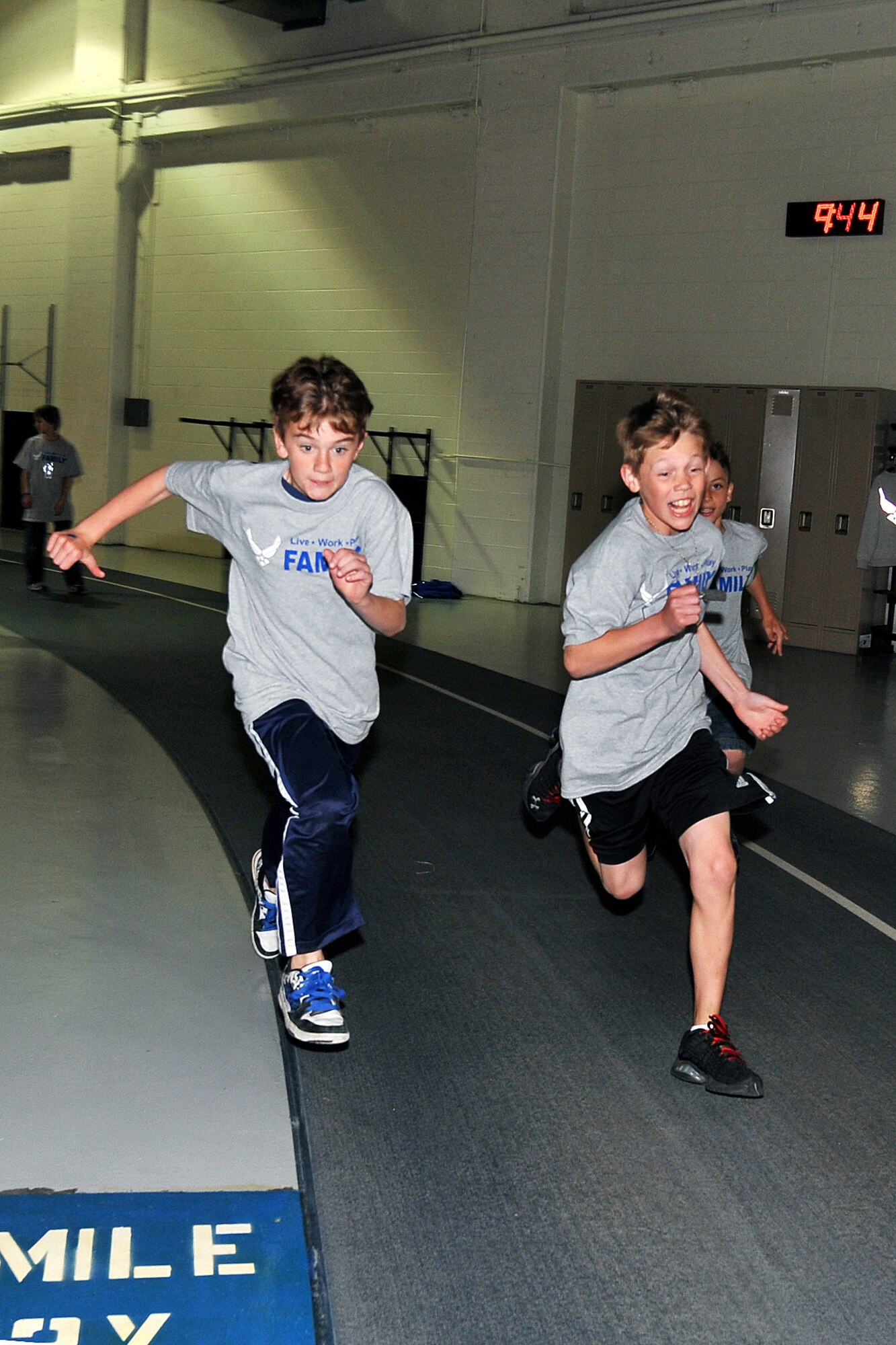 OFFUTT AIR FORCE BASE, Neb. -- Children run around the track inside the Offutt Field House May 7 as part of Offutt's second Junior PDF Line. More than 260 military children attended the event to gain a better understanding of what their parents experience when they deploy. U.S. Air Force Photo by Charles Haymond