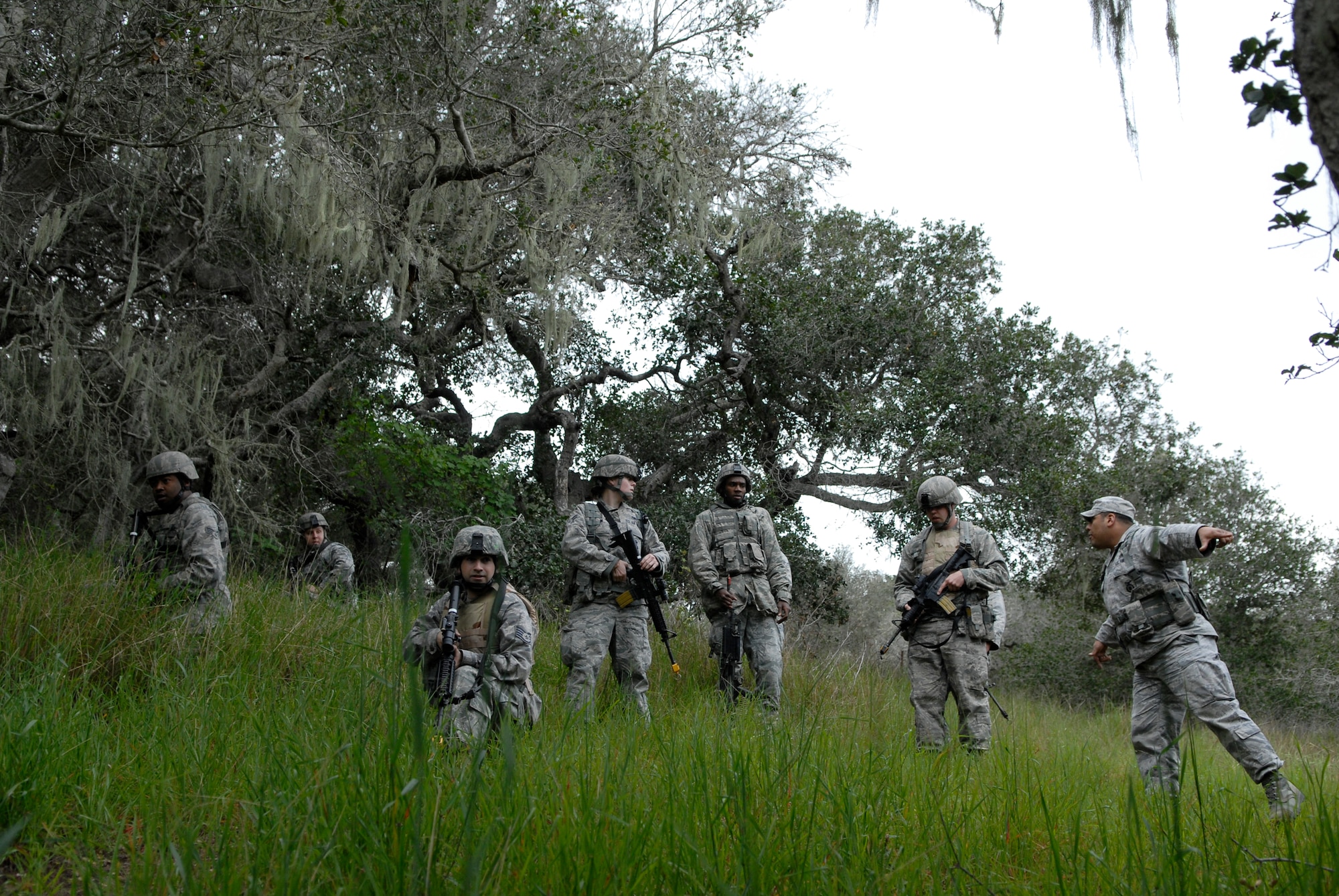 VANDENBERG AIR FORCE BASE, Calif. -- Airmen in the 30th Security Forces Squadron Delta Flight participate in a combat readiness training course here Tuesday, Feb. 23, 2010.  Throughout the training, the Airmen learned to work as a team and communicate with their fellow teammates.  (U.S. Air Force photo/Senior Airman Andrew Satran) 


 
 


 


 
