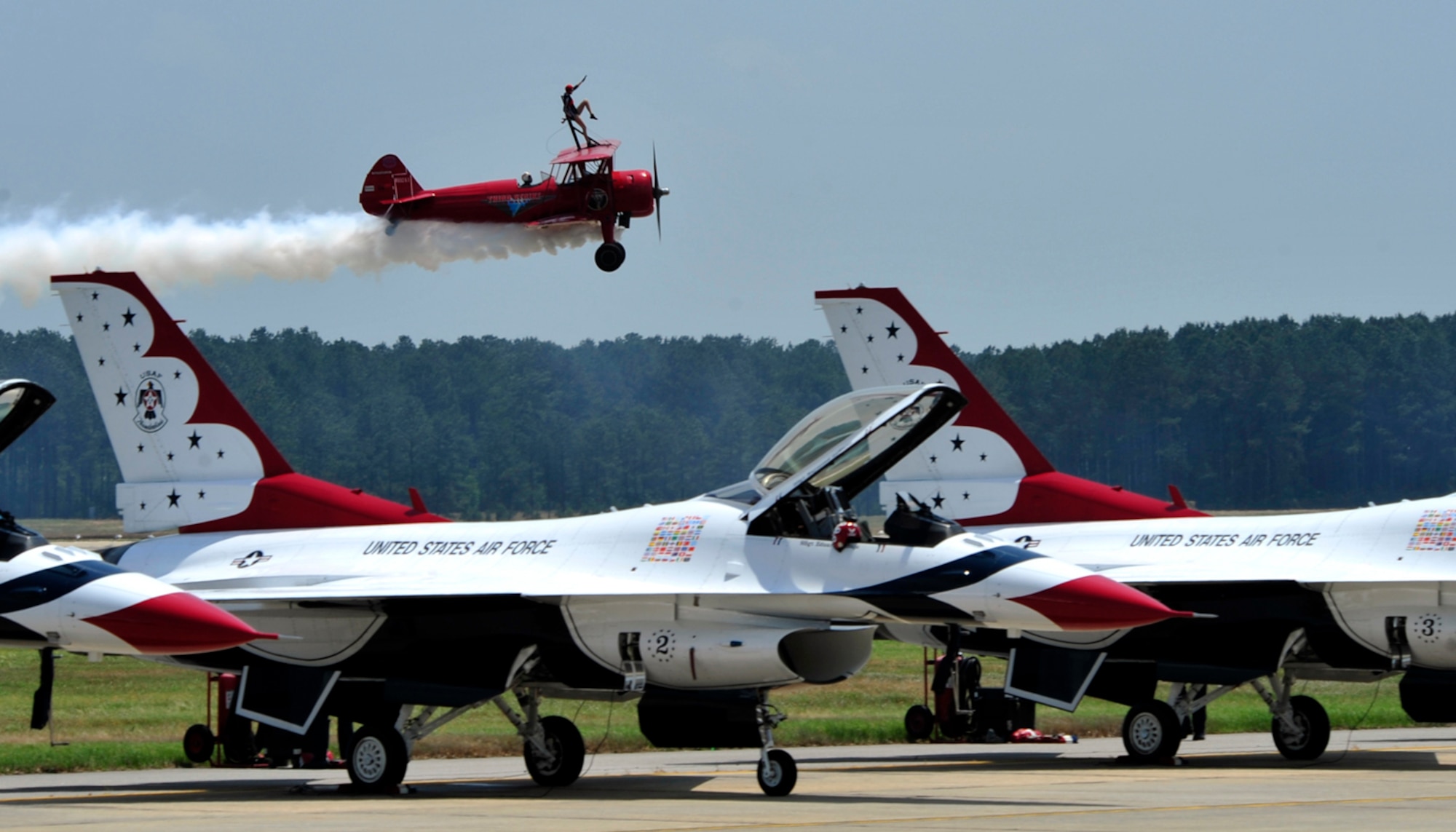100508-F-4983M-248
SHAW AIR FORCE BASE, S.C. - Carol Pilon, owner, operator and lead wing walker, performs for ShawFest 2010. ShawFest is held every other year, with many different performances and static aircraft displays. (U.S. Air Force photo/Staff Sgt Patrick Mitchell)