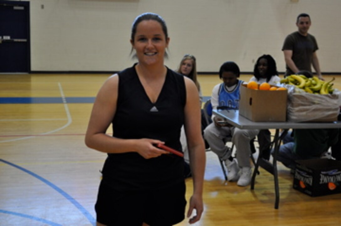 LANGLEY AIR FORCE BASE, Va. -- Staff Sgt. Maura Johnson, Air Combat Command, smiles following her final weigh-in at the 2010 Langley's Biggest Loser finale. Johnson took first place in the women's competition with a 26 percent weight loss. (Courtesy photo)