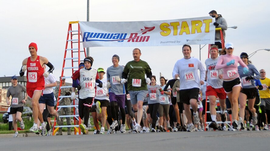 OFFUTT AIR FORCE BASE, Neb. -- More than 140 runners begin the third annual Bellevue-Offutt Runway Run at the Bellevue Welcome Center in Bellevue, Neb., May 9. The seven mile race included about two miles of Offutt's runway. U.S. Air Force Photo by Jeff W. Gates