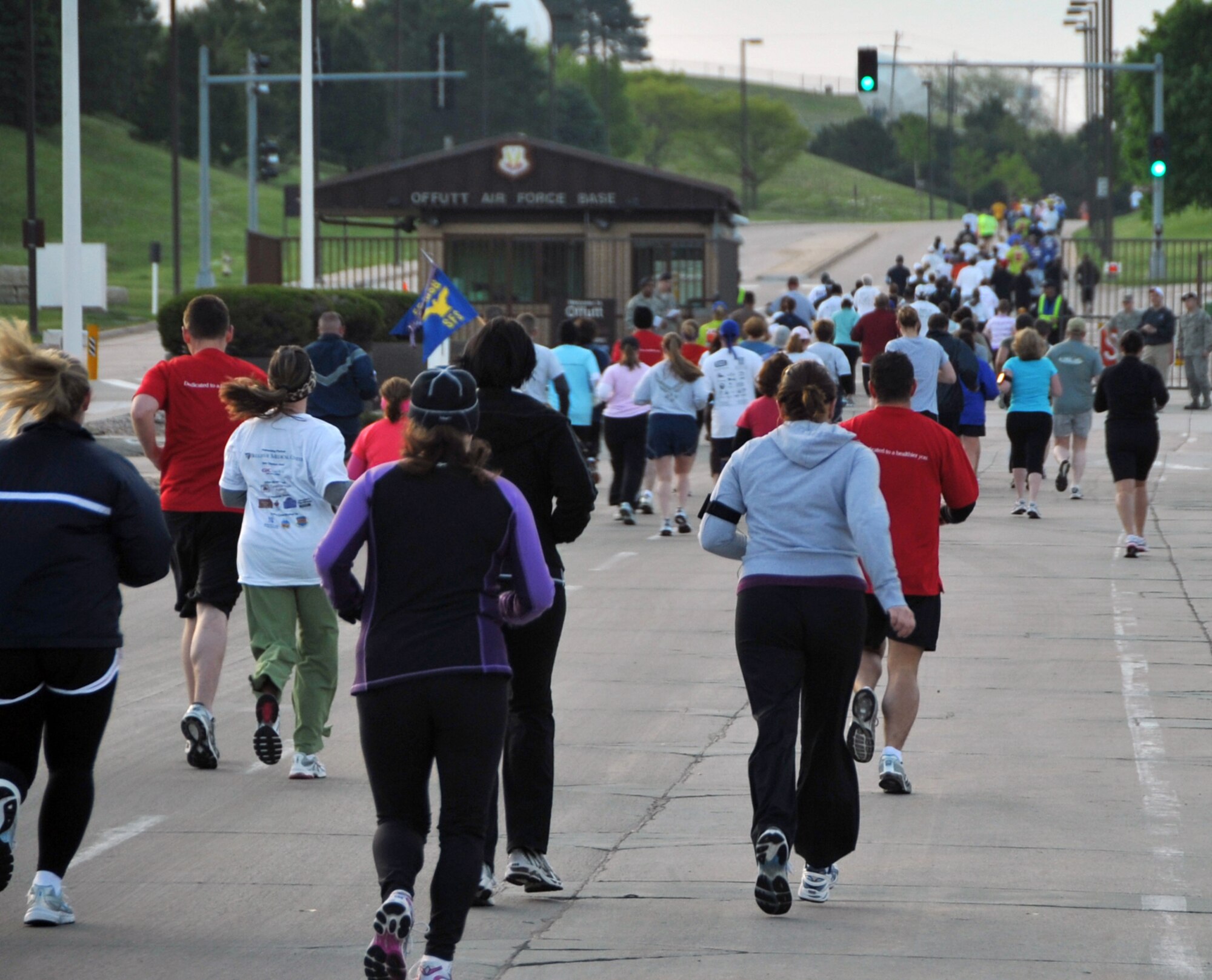 OFFUTT AIR FORCE BASE, Neb. -- More than 140 participants of the third annual Bellevue-Offutt Runway Run run through the Kenney Gate here May 9. The seven mile race started at the Bellevue Welcome Center in Bellevue, Neb., and included about two miles of Offutt's runway. U.S. Air Force Photo by Jeff W. Gates