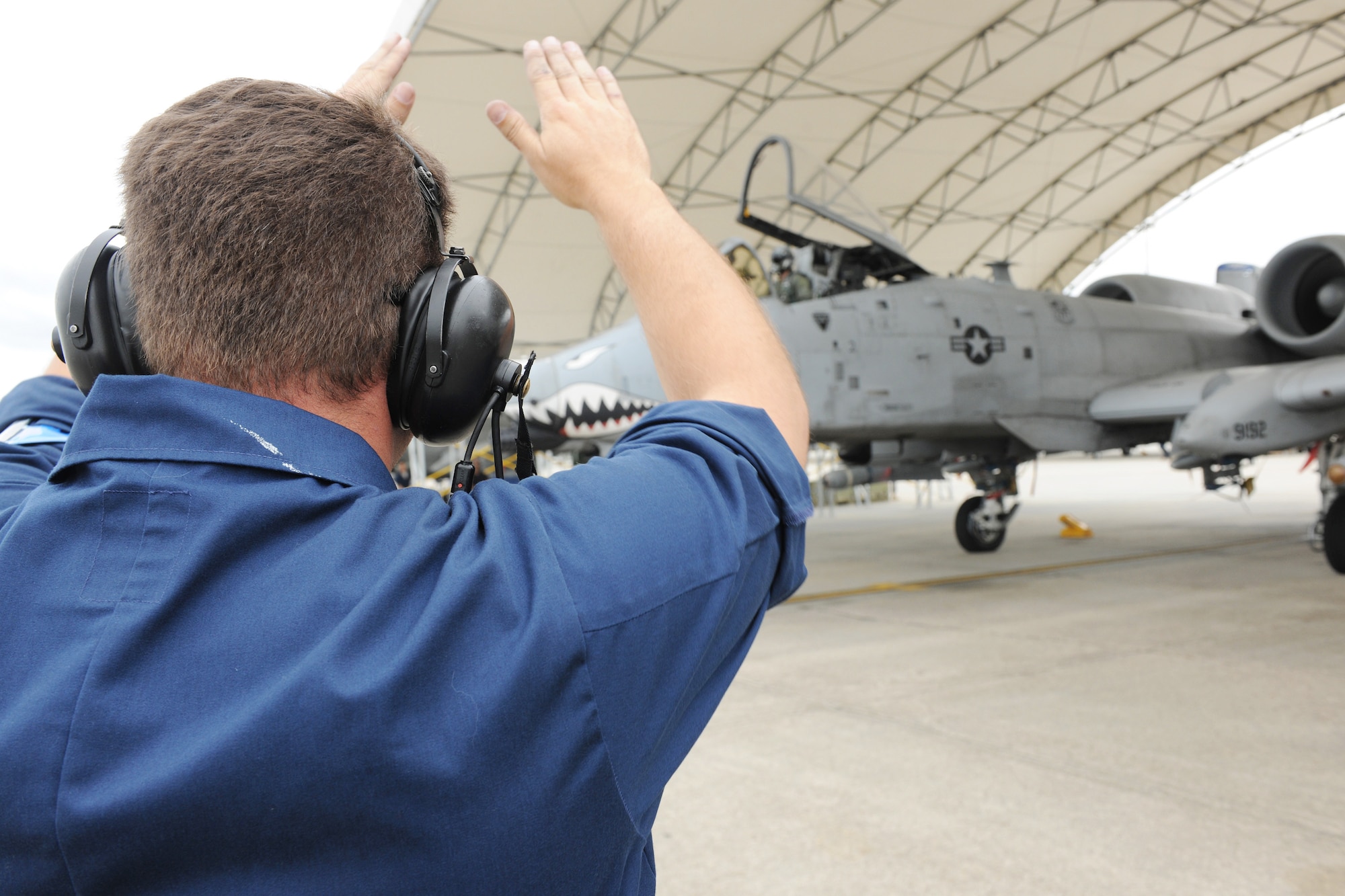 Tech. Sgt. Michael Taylor prepares to launch an A-10C Thunderbolt II during the 74th Fighter Squadron surge operations April 27, 2010, at Moody Air Force, Ga. The surge operation's main focus was to test sortie production capability. Sergeant Taylor is a 74th Fighter Squadron crew chief. (U.S. Air Force photo/Airman 1st Class Benjamin Wiseman)