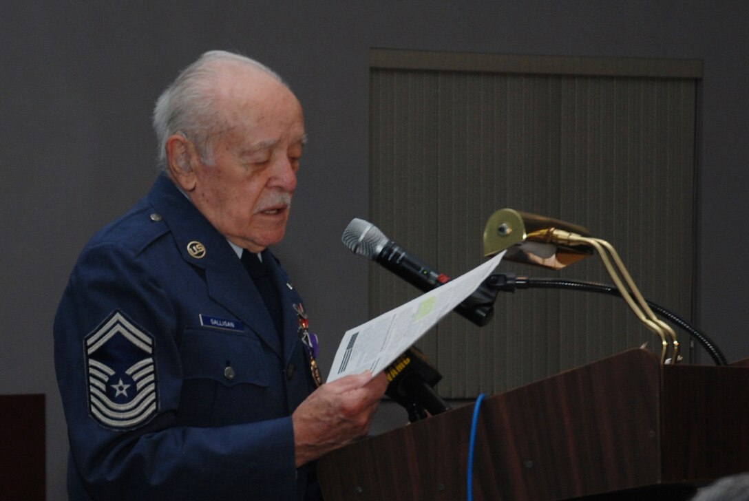 Chief Master Sgt. Francis Galligan is awarded the Bronze Star and Purple Heart at a ceremony held at the Westover Conference Center May 10.  The long-delayed medals recognize the Chief's actions during the Bataan Death March in World War II.