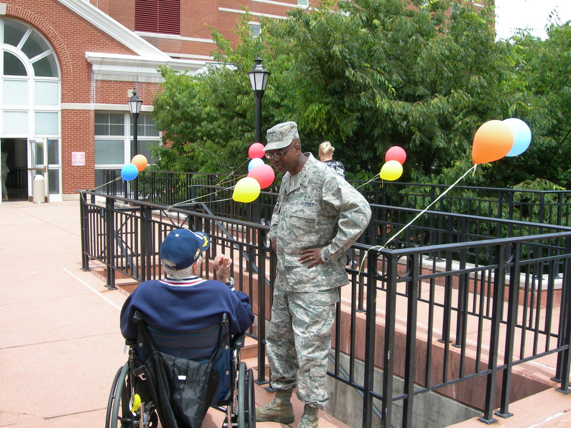 Air Force District of Washington Chaplain Wally Vaughn shares a conversation with one of the residents during the Armed Forces Retirement Home’s May Spring Cookout. The event was held May 7, 2010 at the Armed Forces Retirement Home Washington, D.C.  (U.S. photo by Aletha Frost)