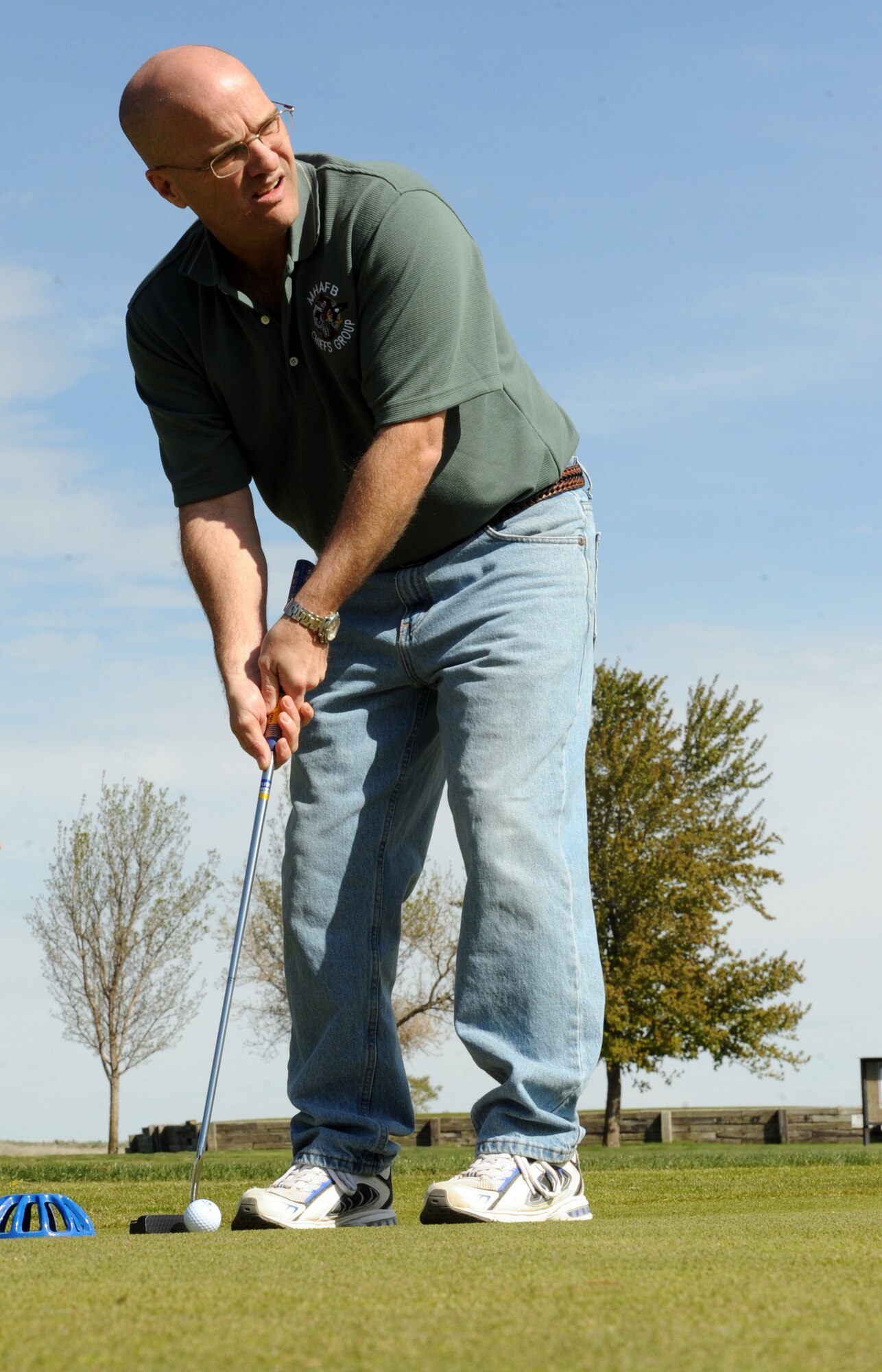 MOUNTAIN HOME AIR FORCE BASE, Idaho – Chief Master Sgt. Ernest Lhamon, 366th Component Maintenance Squadron first sergeant, putts during the Chiefs vs. Colonel chipping and putting competition at the Air Force Assistant Fund golf tournament at the Silver Sage Golf Course May 7. The Colonels won the competition after a tie-breaker. (U.S. Air Force photo by Airman 1st Class Debbie Lockhart)