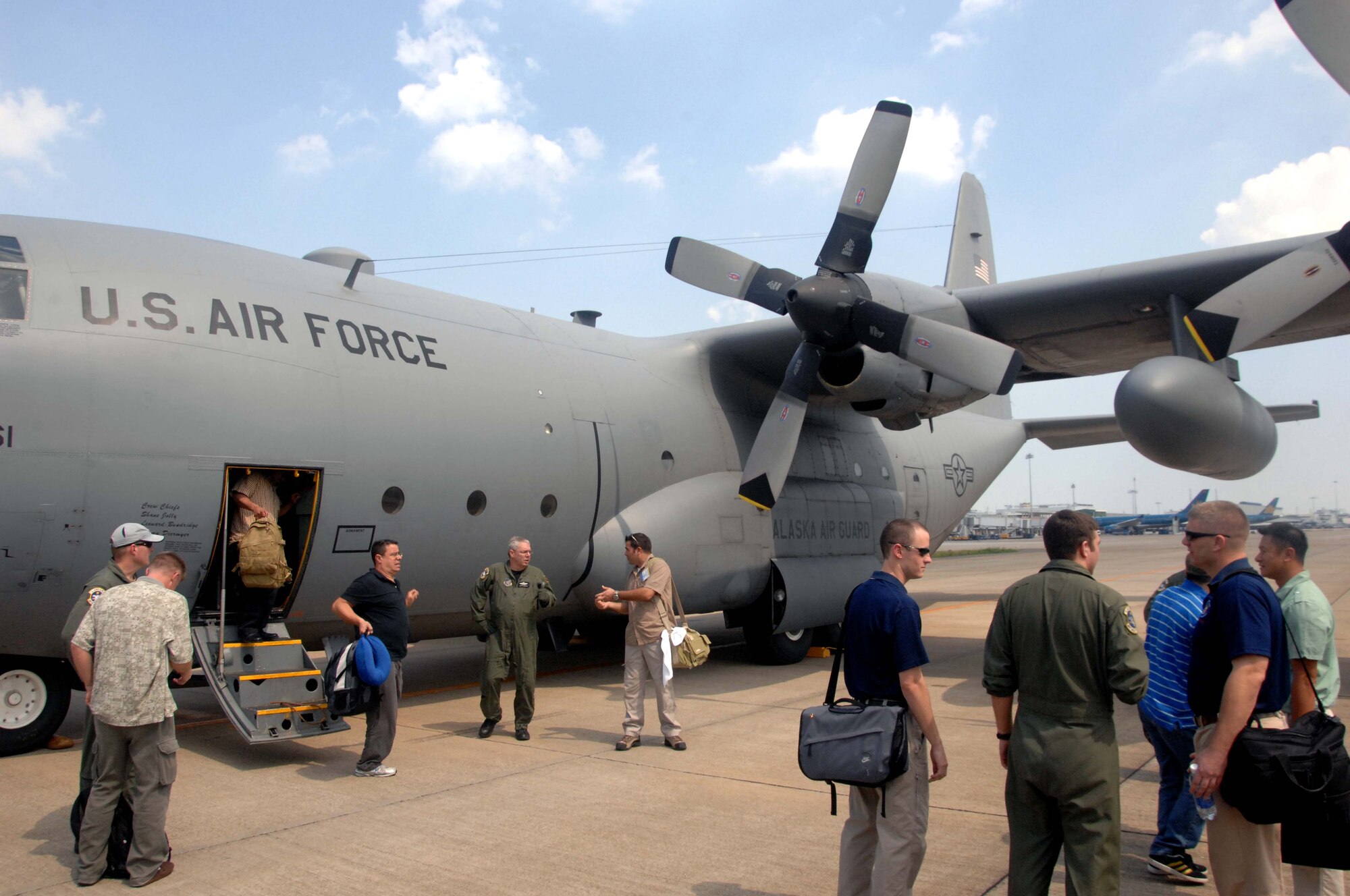 A C-130 Hercules from the 144th Airlift Squadron at Kulis Air National Guard Base, Alaska, arrived at Ho Chi Minh City, Vietnam, with 39 military personnel from bases around the Pacific and continental U.S. as part of Operation Pacific Angel 10-2, May 8.  Pacific Angel is a humanitarian and civic assistance program conducted in the Pacific area of responsibility to support U.S. Pacific Command's capacity-building efforts. This is the second time the operation has been held in Vietnam.  Pacific Angel 10-2 will be executed in villages around the city of Can Tho.  (U.S. Air Force photo by Capt. Timothy Lundberg)
