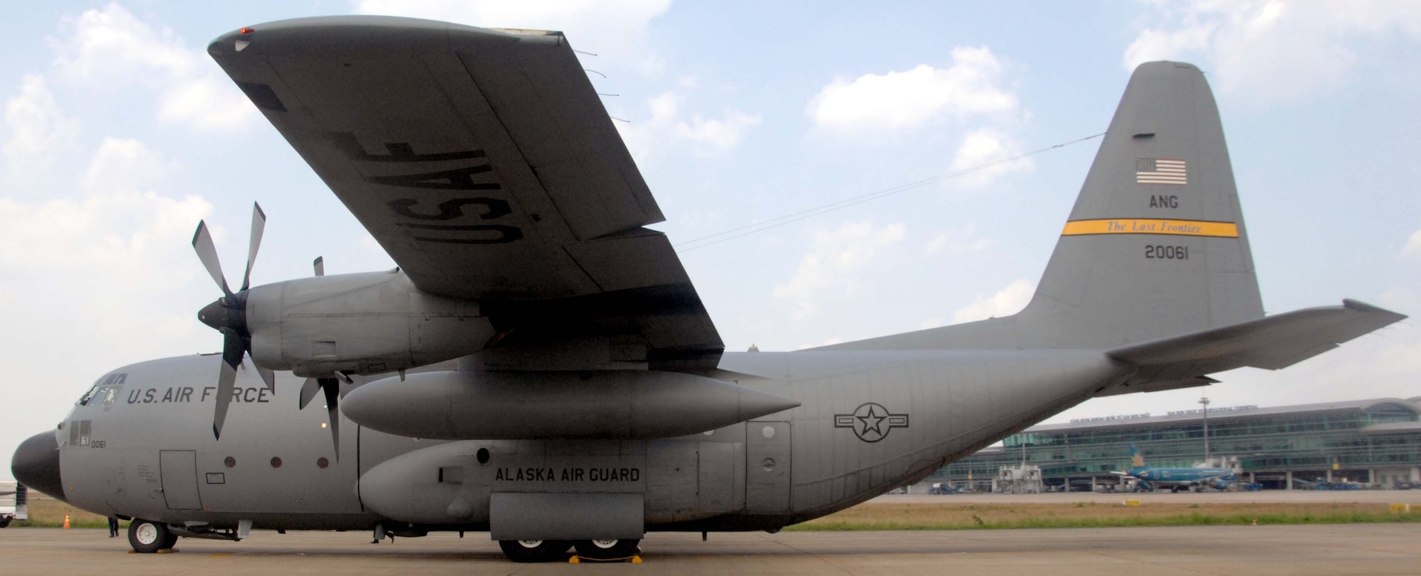 A C-130 Hercules from the 144th Airlift Squadron at Kulis Air National Guard Base, Alaska, arrived at Ho Chi Minh City, Vietnam, with 39 military personnel from bases around the Pacific and continental U.S. as part of Operation Pacific Angel 10-2.  Pacific Angel is a humanitarian and civic assistance program conducted in the Pacific area of responsibility to support U.S. Pacific Command's capacity-building efforts. This is the second time the operation has been held in Vietnam.  Pacific Angel 10-2 will be executed in villages around the city of Can Tho.  (U.S. Air Force photo by Capt. Timothy Lundberg)
