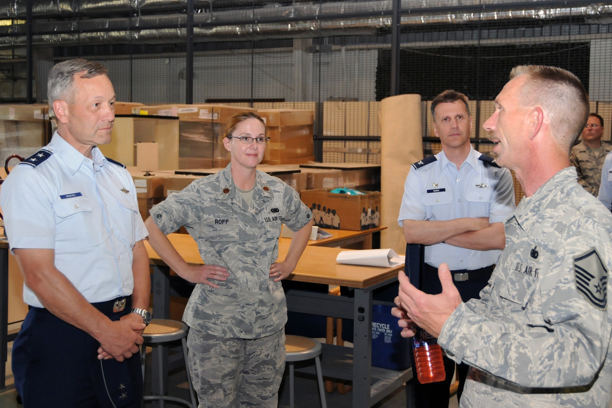 Master Sgt. Chris Burket, 916th Logistics Readiness Squadron, talks to Maj. Gen. Crabtree, 4th Air Force commander, about issues in the LRS while Col. Randall Ogden, 916th ARW commander and Maj. Cherie Roff, LRS commander, look on. (USAF photo by TSgt. Scotty Sweatt)