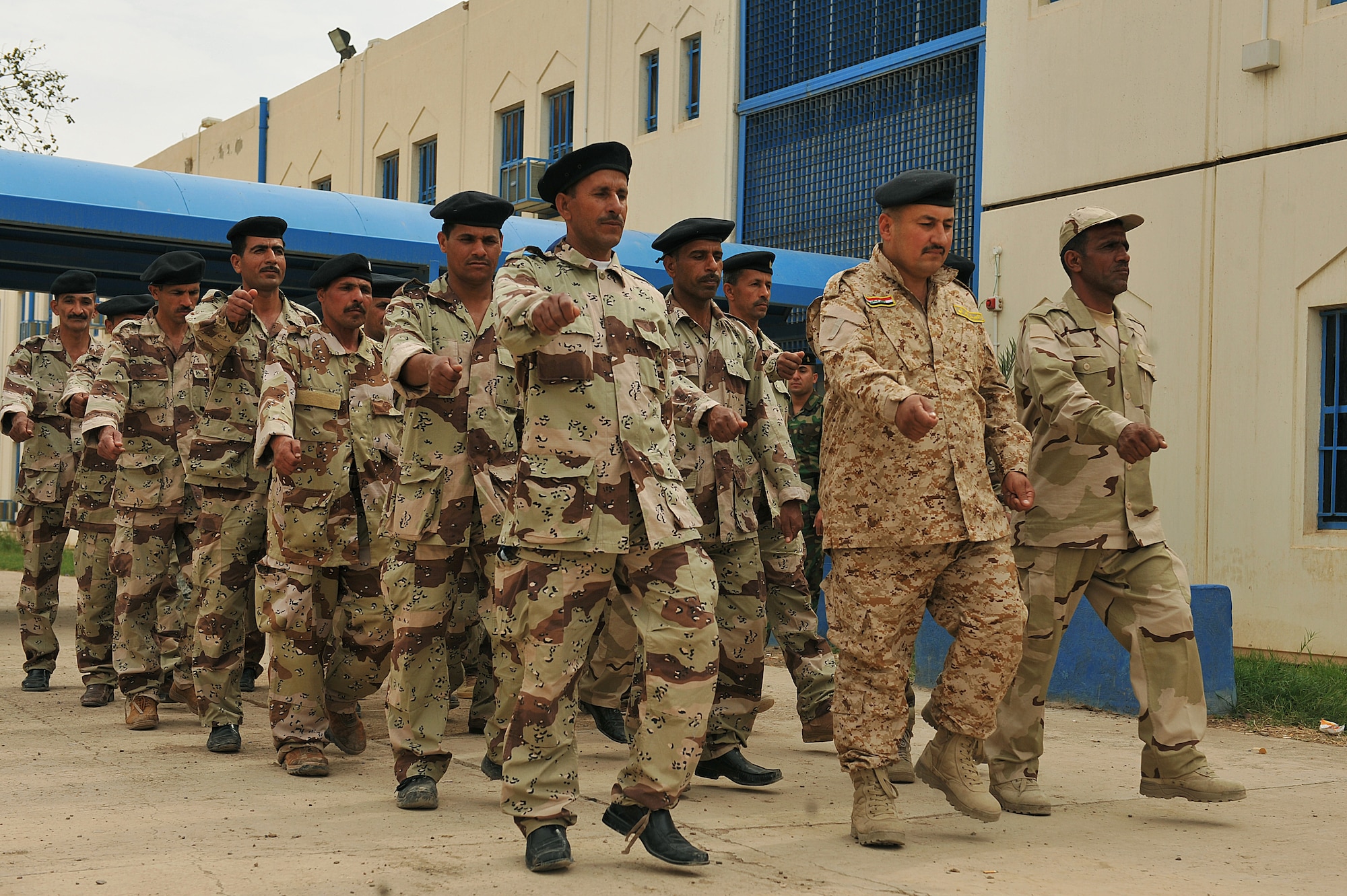 Iraqi Air Force airmen practice marching at Camp Taji, Iraq, April 18, 2010. The Iraqi airmen volunteered to return to active duty through the rehire program by the Ministry of Defense.  (U.S. Air Force photo/Staff Sgt Quinton Russ/released)