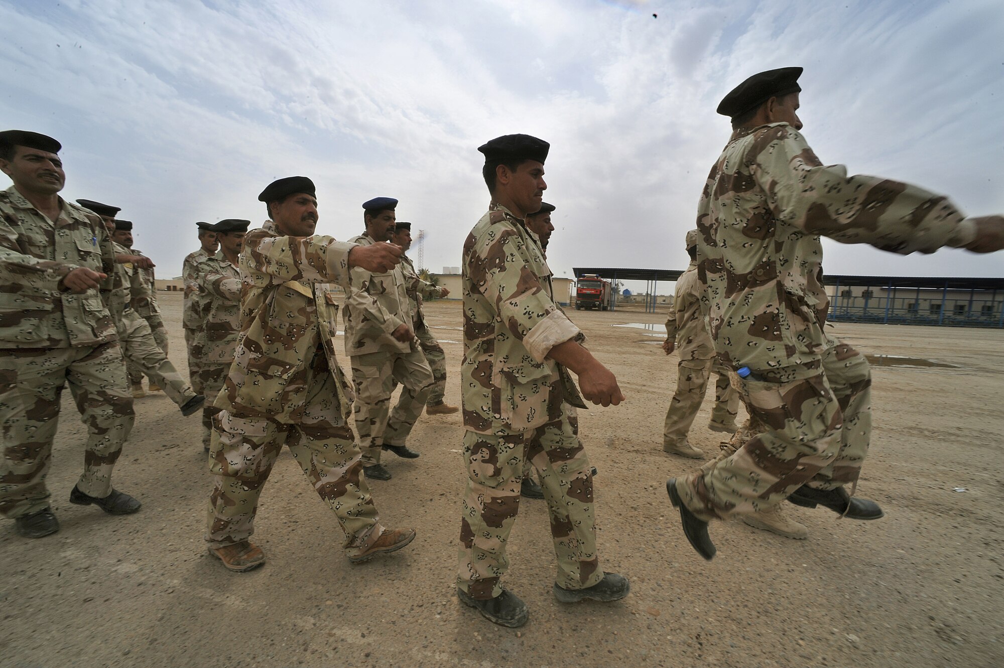 Iraqi Air Force airmen practice marching at Camp Taji, Iraq, April 18, 2010. The Iraqi airmen volunteered to return to active duty through the rehire program by the Ministry of Defense.  (U.S. Air Force photo/Staff Sgt Quinton Russ/released)