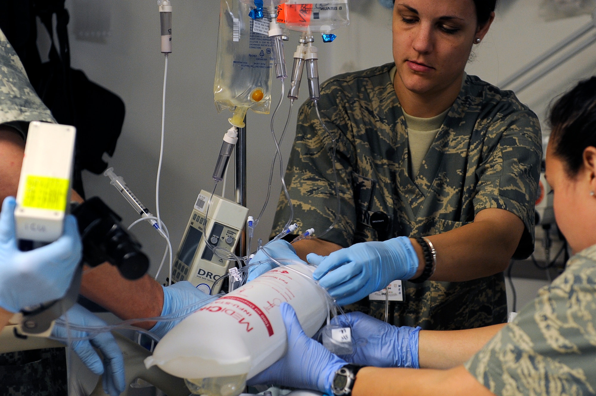 U.S. Air Force 1st Lt. Erica Horan, 455th Expeditionary Medical Group/Task Force Medical East, provides medical assistance for a patient for recovery after surgery at the Craig Joint Theater Hospital, Bagram Airfield, Afghanistan, May 5, 2010. Lieutenant Horan is deployed from Travis Air Force Base, Calif, and is from North Easton, Mass. (U.S. Air Force photo by/ Master Sgt. Jeromy K. Cross/released)
