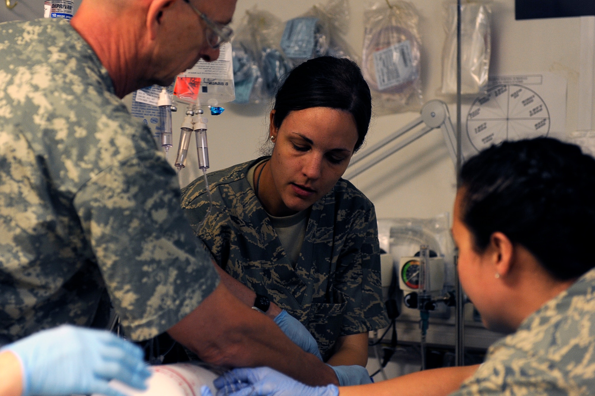 U.S. Air Force 1st Lt. Erica Horan, 455th Expeditionary Medical Group/Task Force Medical East, provides medical assistance for a patient for recovery after surgery at the Craig Joint Theater Hospital, Bagram Airfield, Afghanistan, May 5, 2010. Lieutenant Horan is deployed from Travis Air Force Base, Calif., and is from North Easton, Mass. (U.S. Air Force photo by/ Master Sgt. Jeromy K. Cross/released)