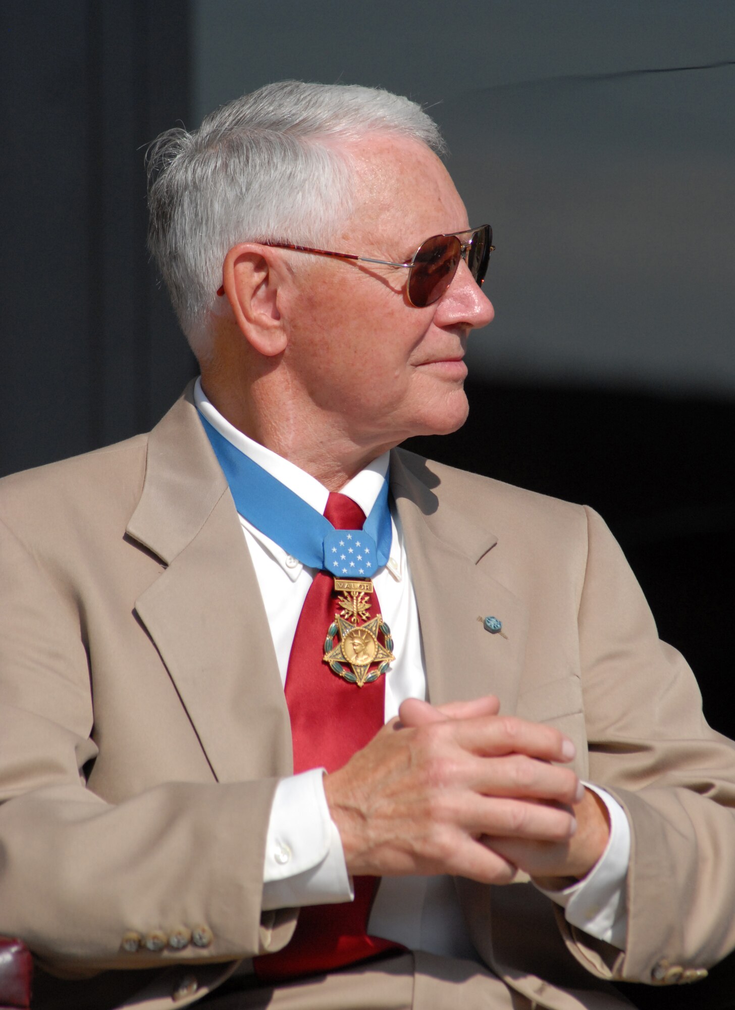 Medal of Honor recipient Col Leo Thorsness waits to speak during a dedication ceremony of two buildings in honor of himself and fellow Medal of Honor recipient Col.  George E. “Bud” Day May 7 on Goodfellow AFB, Texas. (U.S. Air Force photo/Master Sgt. Randy Mallard)