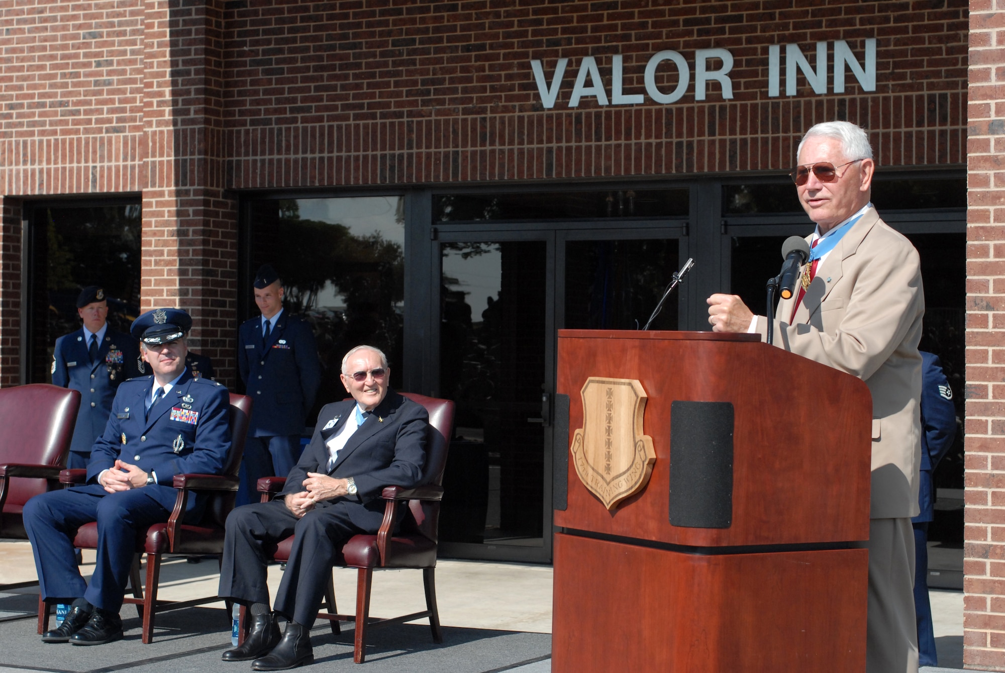 Medal of Honor recipient Col Leo Thorsness speaks during a dedication ceremony of two buildings in honor of himself and fellow Medal of Honor recipient Col.  George E. “Bud” Day May 7 on Goodfellow AFB, Texas. (U.S. Air Force photo/Master Sgt. Randy Mallard)