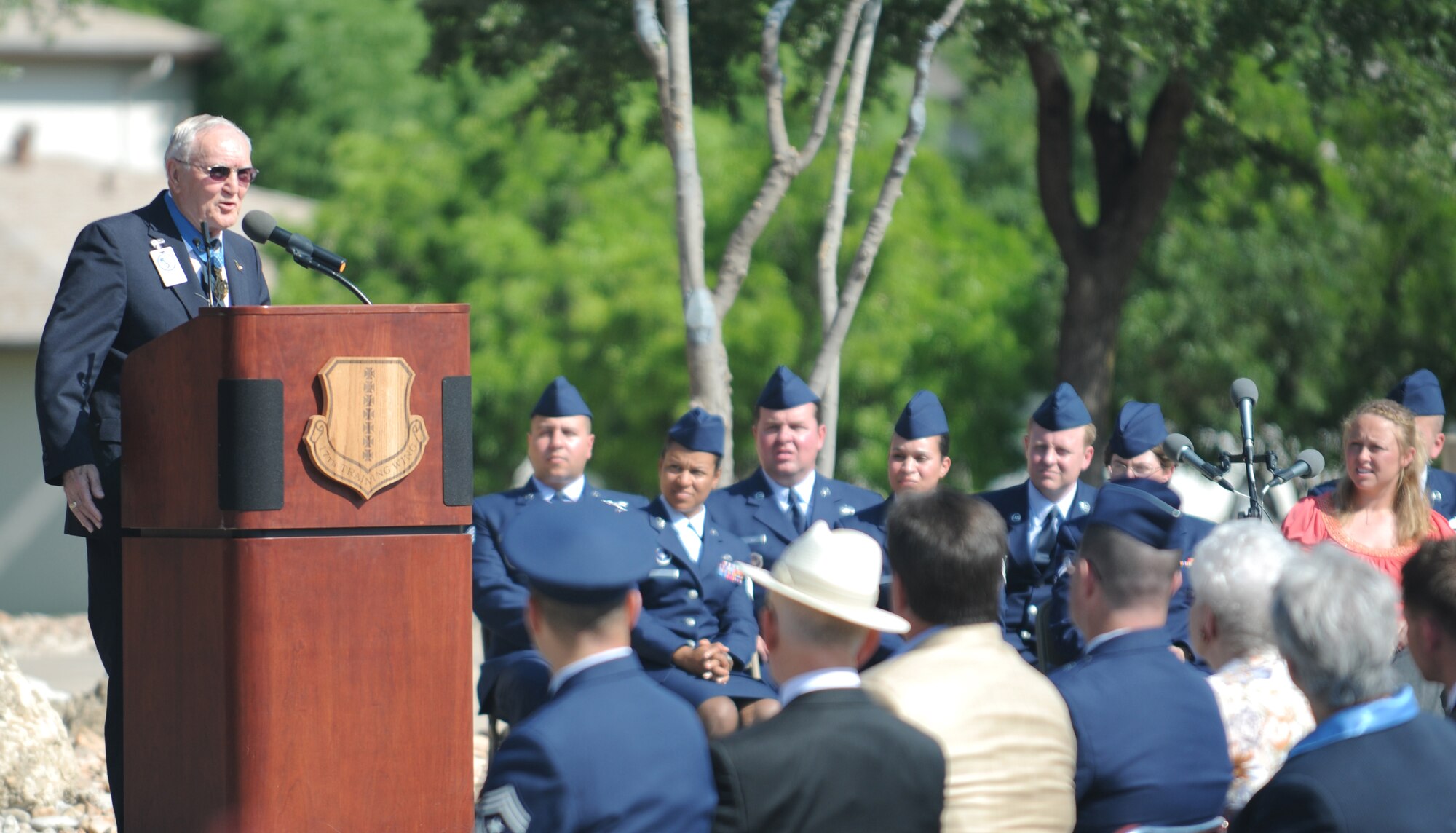 Medal of Honor recipient Col. George E. “Bud” Day speaks during a ceremony dedicating two buildings in honor of himself and fellow Medal of Honor recipient Col Leo Thorsness May 7 on Goodfellow AFB, Texas. (U.S. Air Force photo/Airman 1st Class Clayton Lenhardt) 