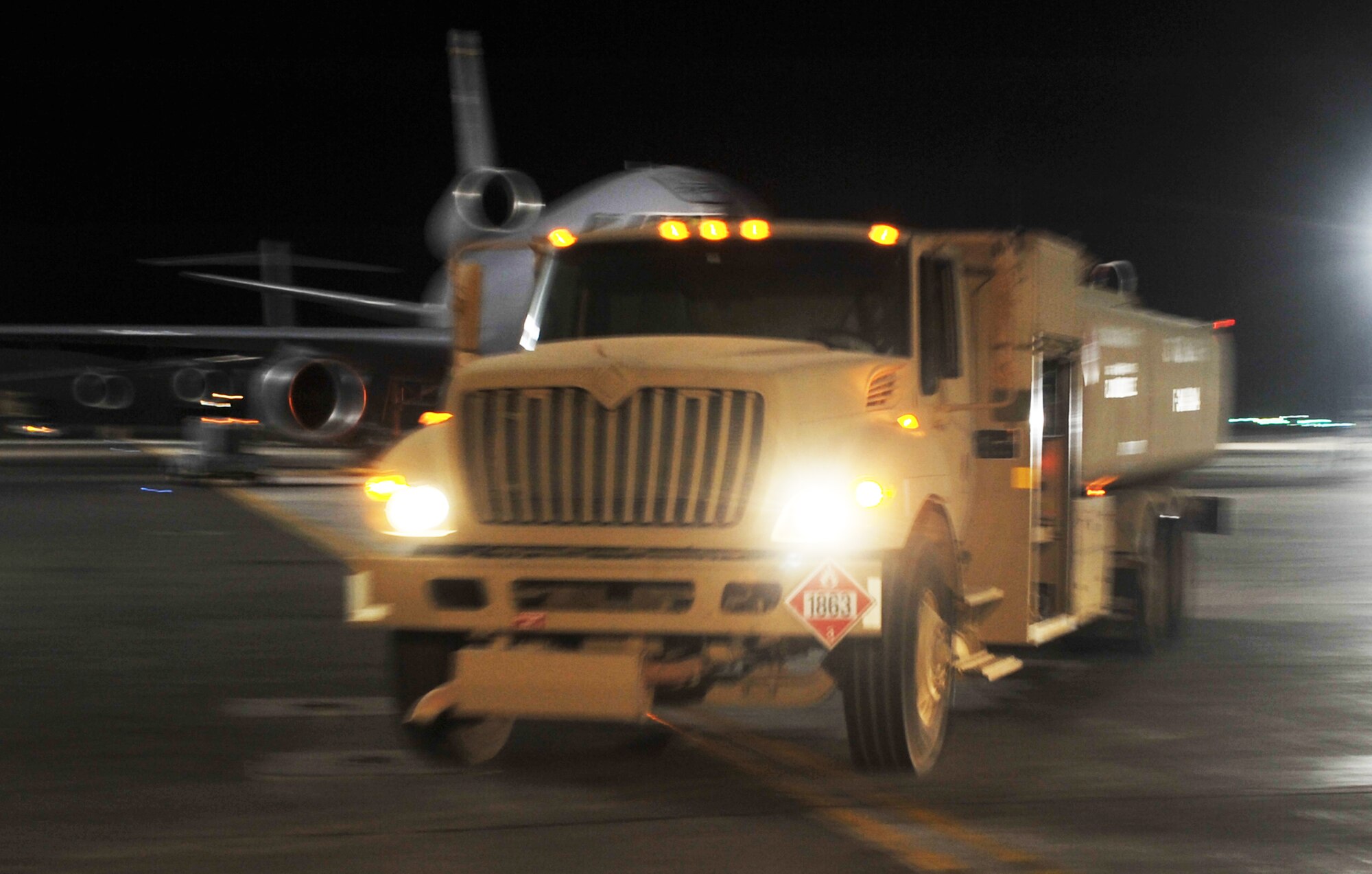 A fuels distribution Airman from the 380th Expeditionary Logistics Readiness Squadron's fuels management flight drives an R-11 fuels truck on the flightline for the 380th Air Expeditionary Wing at a non-disclosed base in Southwest Asia on May 1, 2010. In all, the fuels management flight pumped more than 43 million gallons of fuel in the first four months of 2010 for the 380th Air Expeditionary Wing mission. This effort included continuous refueling operations for all of the deployed 380th AEW assigned aircraft which includes the KC-10 Extender, E-3 Sentry, U-2 Dragon Lady and RQ-4 Global Hawk. (U.S. Air Force Photo/Master Sgt. Scott T. Sturkol/Released)