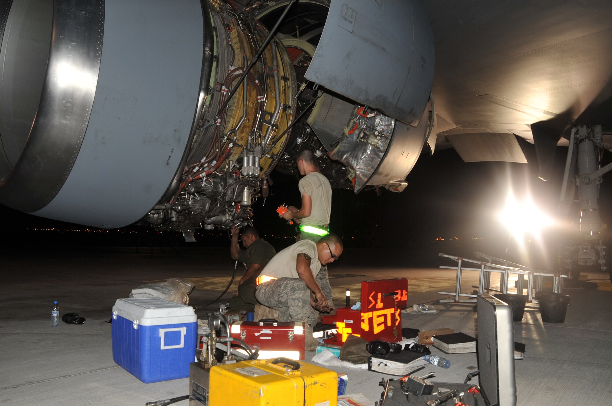 Maintenance Airmen from the 380th Expeditionary Aircraft Maintenance Squadron's Extender aircraft maintenance unit work on a KC-10 Extender during operations for the 380th Air Expeditionary Wing at a non-disclosed base in Southwest Asia on May 1, 2010.  The 380th EAMXS, as part of the 380th AEW, supports operations Iraqi Freedom and Enduring Freedom and the Combined Joint Task Force-Horn of Africa. (U.S. Air Force Photo/Master Sgt. Scott T. Sturkol/Released)