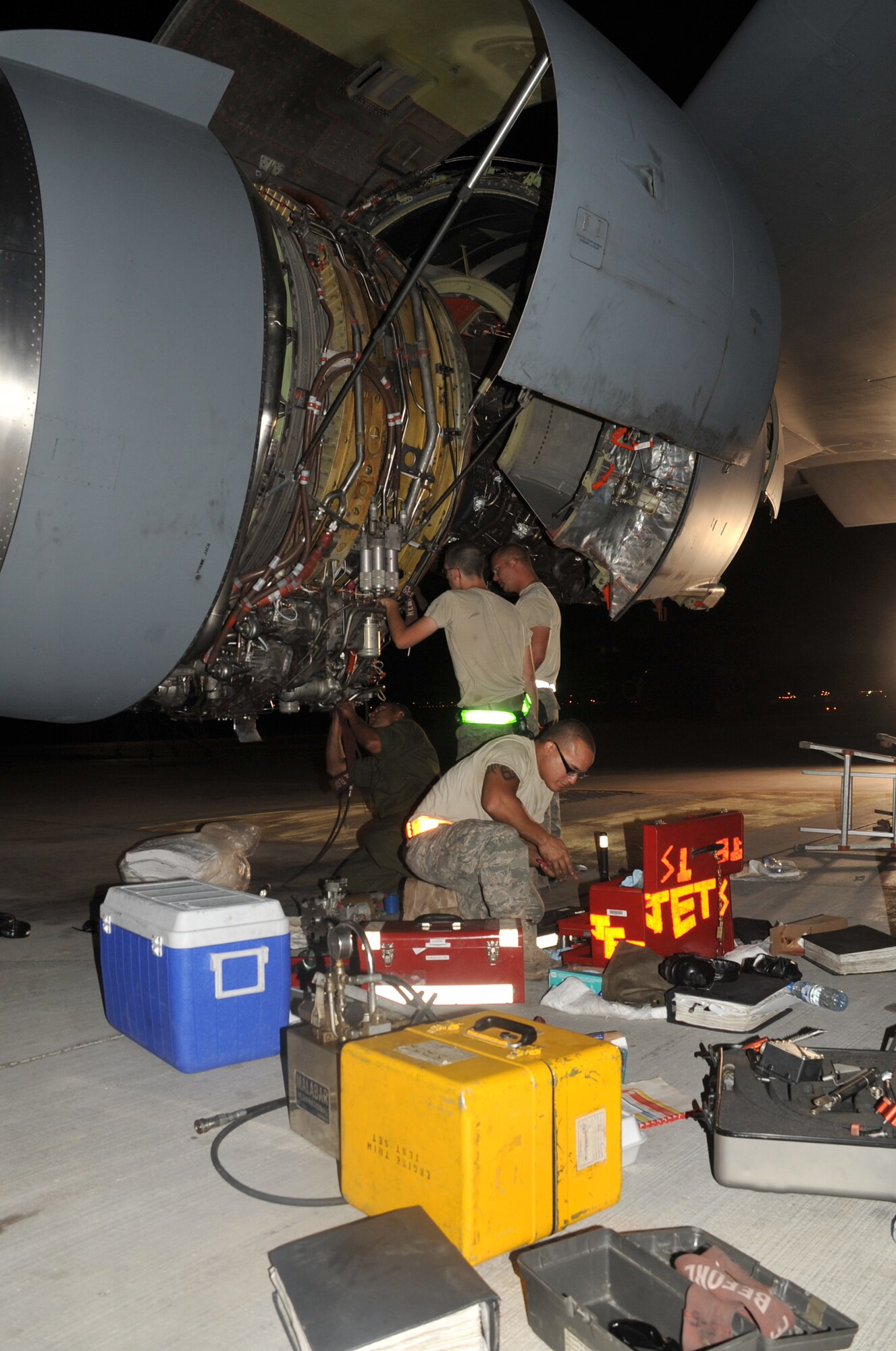 Maintenance Airmen from the 380th Expeditionary Aircraft Maintenance Squadron's Extender aircraft maintenance unit work on a KC-10 Extender during operations for the 380th Air Expeditionary Wing at a non-disclosed base in Southwest Asia on May 1, 2010.  The 380th EAMXS, as part of the 380th AEW, supports operations Iraqi Freedom and Enduring Freedom and the Combined Joint Task Force-Horn of Africa. (U.S. Air Force Photo/Master Sgt. Scott T. Sturkol/Released)