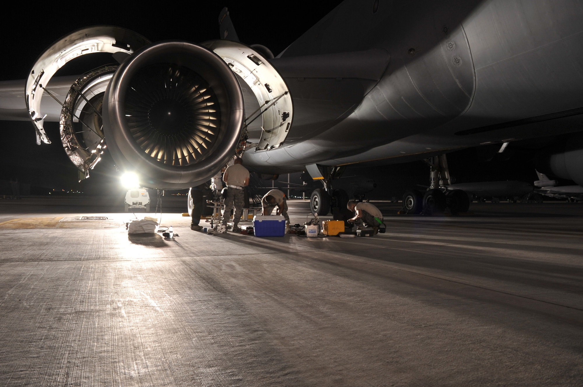 Maintenance Airmen from the 380th Expeditionary Aircraft Maintenance Squadron's Extender aircraft maintenance unit work on a KC-10 Extender during operations for the 380th Air Expeditionary Wing at a non-disclosed base in Southwest Asia on May 1, 2010.  The 380th EAMXS, as part of the 380th AEW, supports operations Iraqi Freedom and Enduring Freedom and the Combined Joint Task Force-Horn of Africa. (U.S. Air Force Photo/Master Sgt. Scott T. Sturkol/Released)