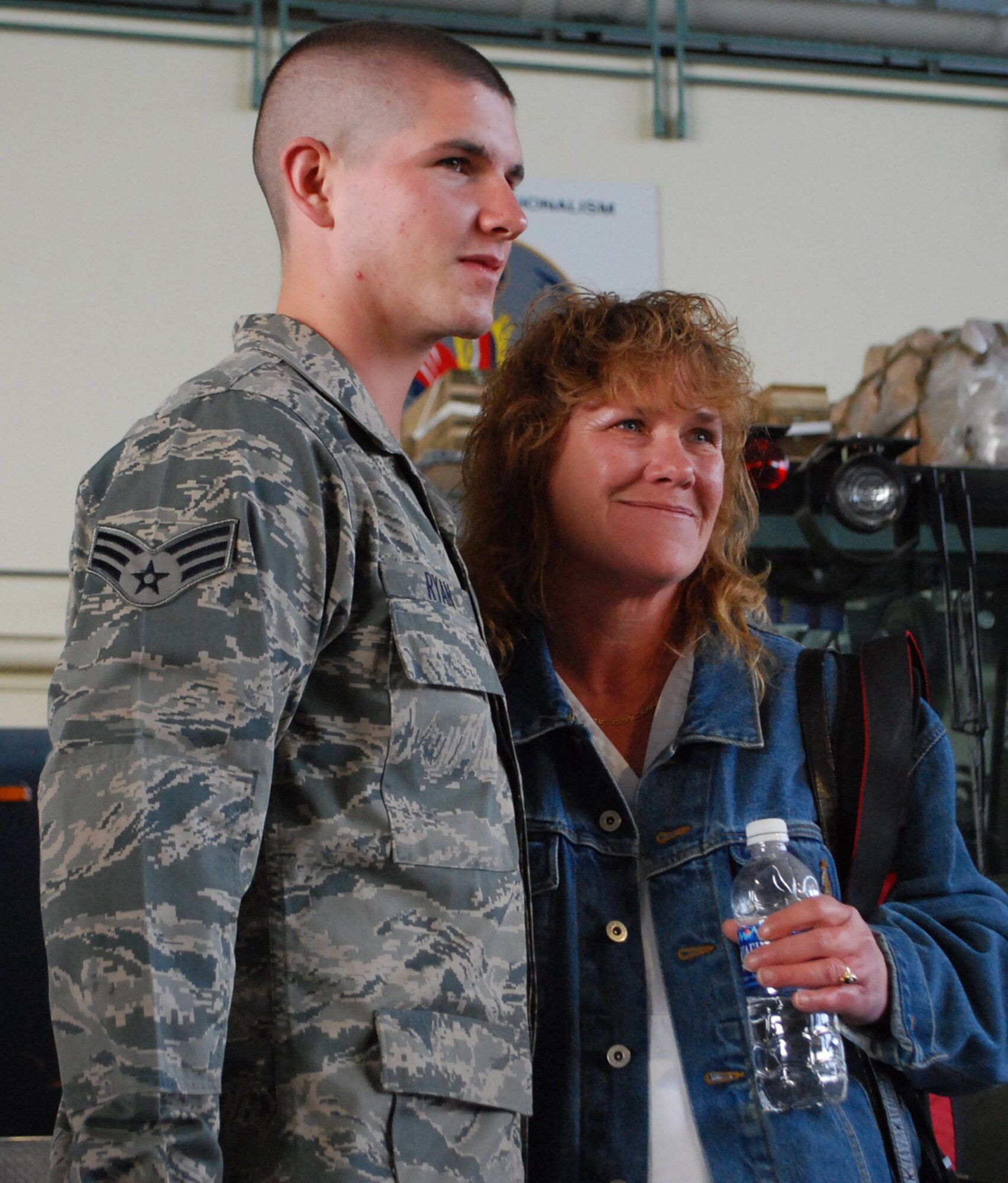 Senior Airman Jake Ryan, a reservist with Westover's 58th Aerial Port Squadron, gets ready to say goodbye to his mom, Joyce Greene, on Mother's Day, May 9. Ryan was one of about 15 airmen who left Westover for a deployment to Afghanistan. He is scheduled to return in the fall.