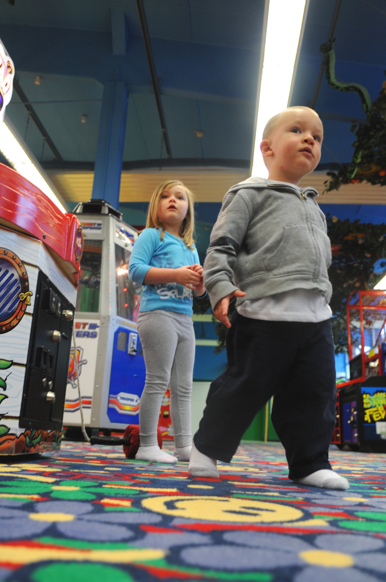 (From left to right) Jada and Niko Saldukas, children of Senior Airman Scott Saldukas, 86th Airlift Wing public affairs manuever their way through the 'Kid Zone' on Pulaski Barracks, Germany, May 4, 2009. The 'Kid Zone' reopened April 17 after a six-month renovation process to modernize the center.