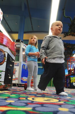 (From left to right) Jada and Niko Saldukas, children of Senior Airman Scott Saldukas, 86th Airlift Wing public affairs manuever their way through the 'Kid Zone' on Pulaski Barracks, Germany, May 4, 2009. The 'Kid Zone' reopened April 17 after a six-month renovation process to modernize the center.
