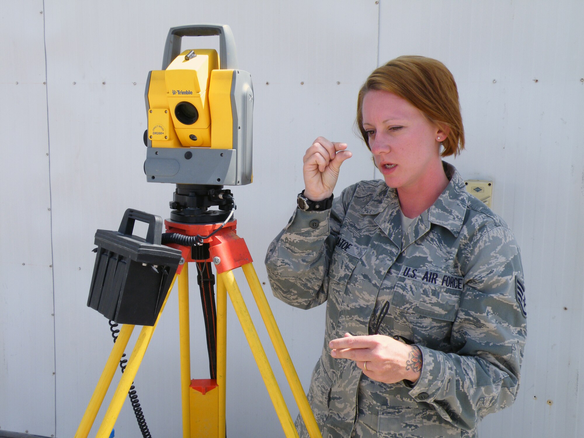 Staff Sgt. Jammie Catoe, engineering journeyman or engineering assistant with the 380th Expeditionary Civil Engineer Squadron, uses surveying equipment during operations for the 380th Air Expeditionary Wing at a non-disclosed base in Southwest Asia on May 8, 2010. Sergeant Catoe is deployed from the 20th Civil Engineer Squadron at Shaw Air Force Base, S.C., and her hometown is Lancaster, S.C. (U.S. Air Force Photo/Staff Sgt. Nathan D. Delgado/Released)