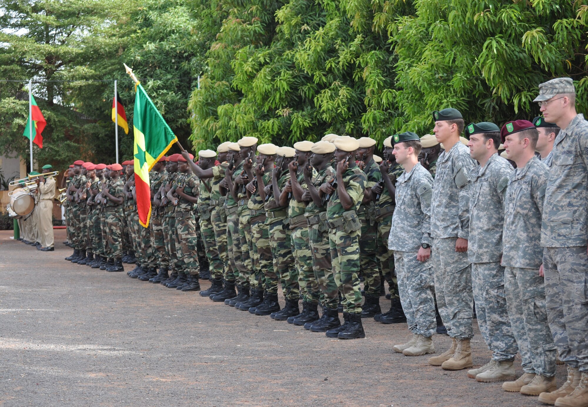 BAMAKO, Mali – Members of the 352nd Special Operations Group, RAF Mildenhall, United Kingdom, stand in formation with members of the Republic od Mali and U.S. Army forces at the opening ceremony for Exercise Flintlock 10, held here, May 3.  Flintlock 10 is an annual exercise aimed at strengthening security and stability in the Trans-Saharan area.  About 1,200 European, African Partner Nation and U.S. participants from 14 nations are involved in military interoperability activities across the Trans-Saharan region during this event.  The exercise runs through May 23.  (U.S. Air Force photo/Tech. Sgt. Marelise Wood)