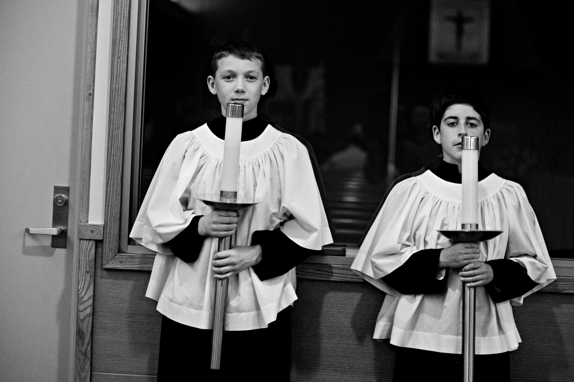 MISAWA AIR BASE, Japan -- Preston Miller and Jacob Beardsley perform candle bearer duties during Misawa's 2010 Confirmation Mass May 6 at the base chapel. Preston is the son of Senior Master Sgt. William Miller, 35th Fighter Wing deputy inspector general, and Jacob is the son of Master Sgt. Jason Beardsley, 35th Security Forces Squadron first sergeant. (U.S. Air Force photo/Senior Airman Jamal D. Sutter)