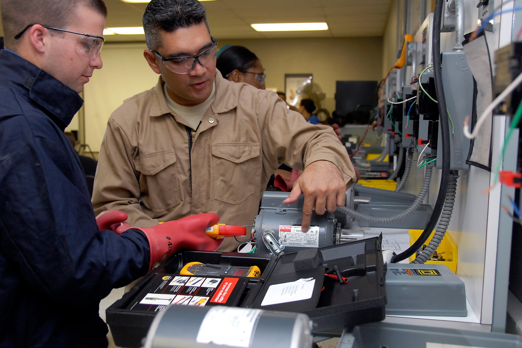 The Air Force Recruiting Service’s video team captured five of Sheppard’s tech training courses on film May 3-7, 2010, to update their recruiting website www.airforce.com. At the 366th Training Squadron, the team highlighted multiple classes in the various training rooms such as the electrical troubleshooting block shown in this photo. (U.S. Air Force photo/Michael Litteken)