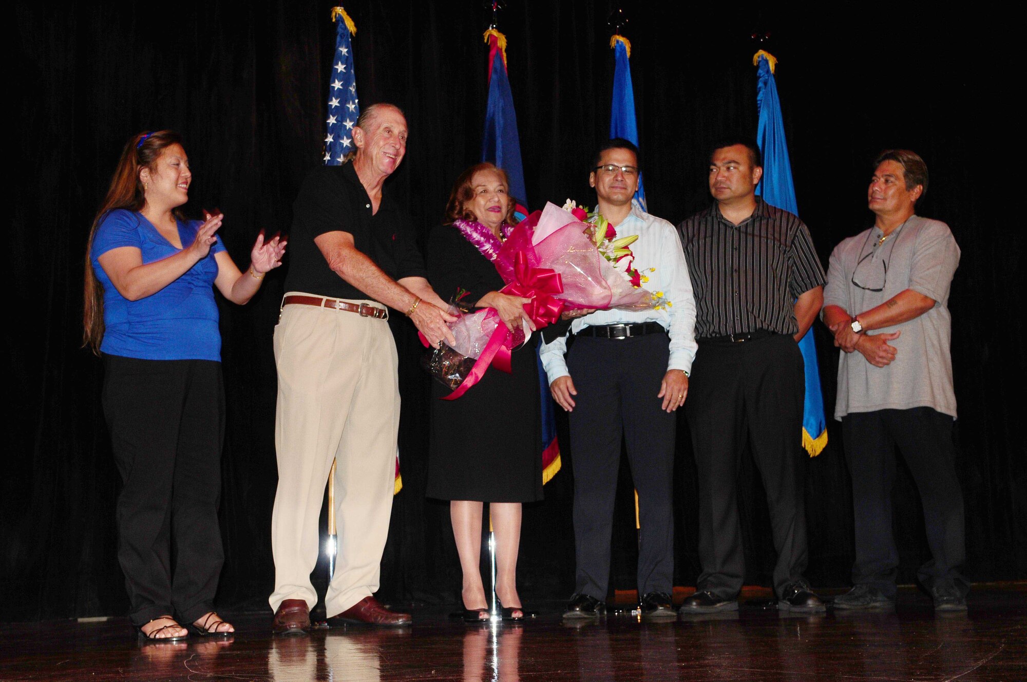 TUMON, Guam - Joyce Martratt, 36th Wing administrative assistant, receives recognition from her family for her 44 years of civilian service here May 7. Mrs. Martratt was recognized for her outstanding service for the Air Force by friends, family and Team Andersen members. (U.S. Air Force photo by Airman 1st Class Jeffrey Schultze)