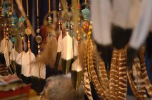ST. PAUL, Minn. -- Native American dream catchers hang above a vendor’s table in the Bazaar at the Festival of Nations held at the Saint Paul RiverCentre here April 30. The Festival of Nations is the largest and longest running multicultural festival in Minnesota. It involves more than 90 different nationalities from around the world. (U.S. Air Force photo by Airman 1st Class Aaron-Forrest Wainwright)