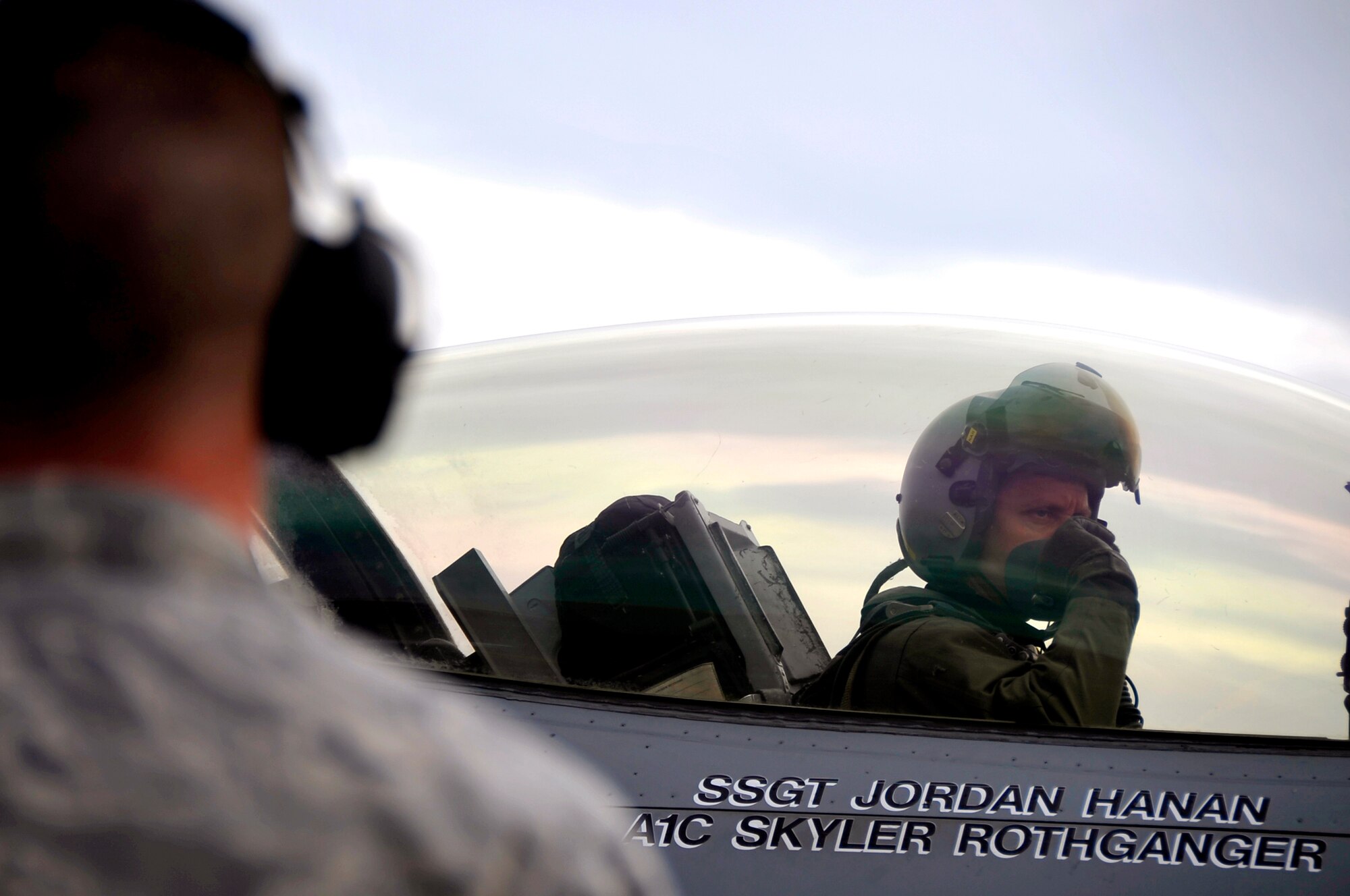 Lt. Col. Aaron Steffens talks with his crew chief before his departure to South Korea May 7, 2010, at Misawa Air Base, Japan. Colonel Steffens and the 14th Fighter Squadron deployed to South Korea in an effort to maintain regional stability. Colonel Steffens is the 14th Fighter Squadron commander. (U.S. Air Force photo/Staff Sgt. Chad C. Strohmeyer)
