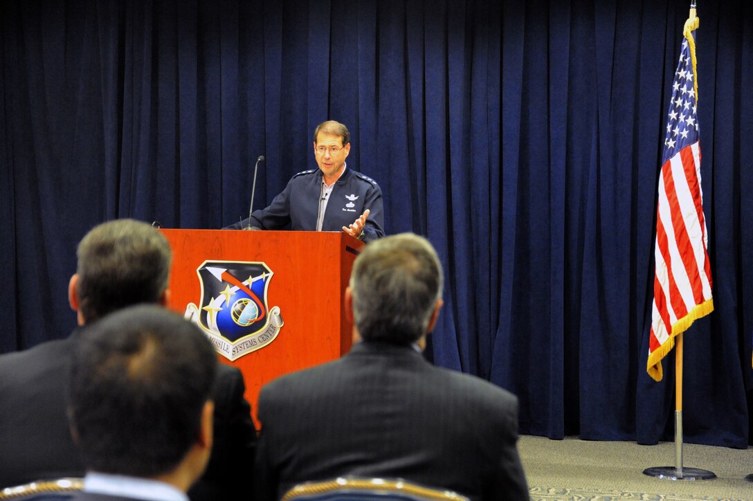 Lt. Gen. John "Tom" Sheridan speaks to mayors and community leaders at the Honorary Commander Induction Ceremony April 26 in the Gordon Conference Center. The Honorary Commanders are part of the Los Angeles Air Force Base Support Team whose purpose is to identify common areas of interest between the civilian and military communities, assist in promoting community understanding, support the Los Angeles AFB mission and host social events and sponsor entertainment that enhance the morale, camaraderie and espirit de corps of Los Angeles AFB personnel and their families. (Photo by Joe Juarez)