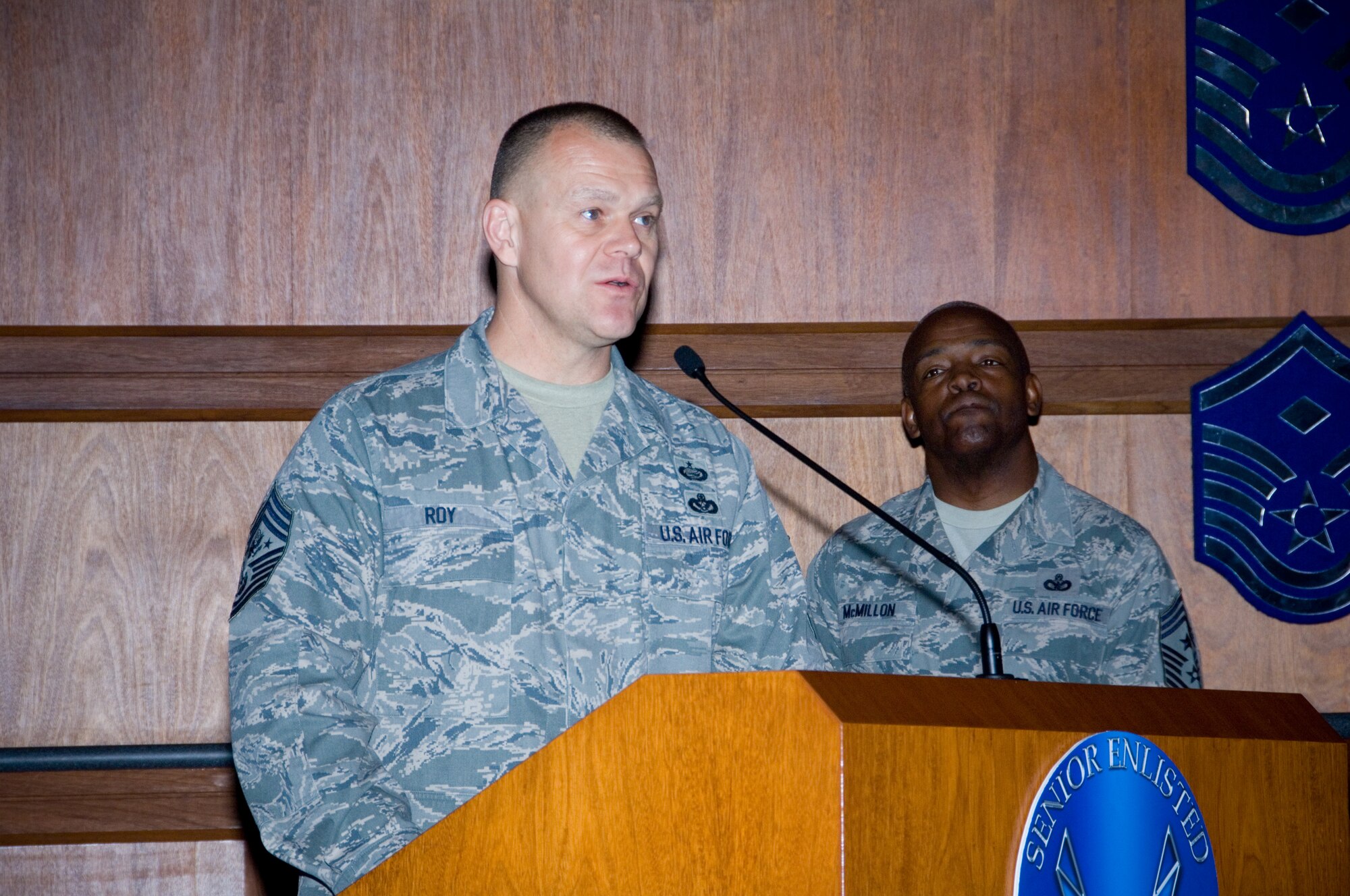 Chief Master Sergeant of the Air Force, James A. Roy speaks to the 370 senior enlisted Air Force, joint and partner nation representatives during the Senior Enlisted Leader Summit, while Chief Master Sgt. Brye McMillon, Air University Command Chief, listens. (Air Force photo/Melanie Rodgers Cox).