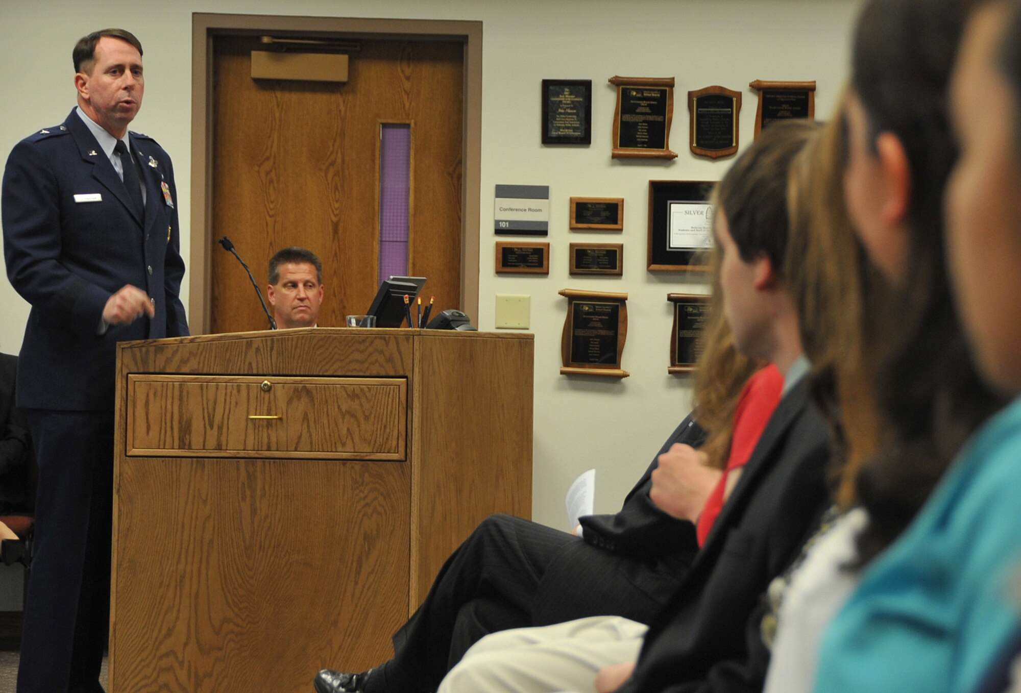 OFFUTT AIR FORCE BASE, Neb. -- Brig. Gen. John N.T. Shanahan, 55th Wing commander, speaks at the Congressional Awards Medal Ceremony at the Bellevue Welcome Center in Bellevue, Neb., May 7. Congressman Lee Terry and Dr. John Deegan, Bellevue Public Schools superintendent also attended the ceremony. The award program offers young people the opportunity to set personal goals and work to achieve them. There are six levels of awards, which include bronze, silver and gold certificates and Medals. U.S. Air Force Photo by Jeff W. Gates.