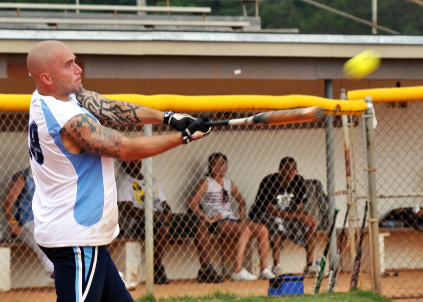 A player swings for the fences during the 2010 Police Week softball tournament held at Eglin Air Force Base, Fla., May 8.  96th Security Forces Squadron won the tournament with a perfect record.  Proceeds raised by the tournament will go to a police officers' memorial.  (U.S. Air Force photo/Ashley M. Wright.)